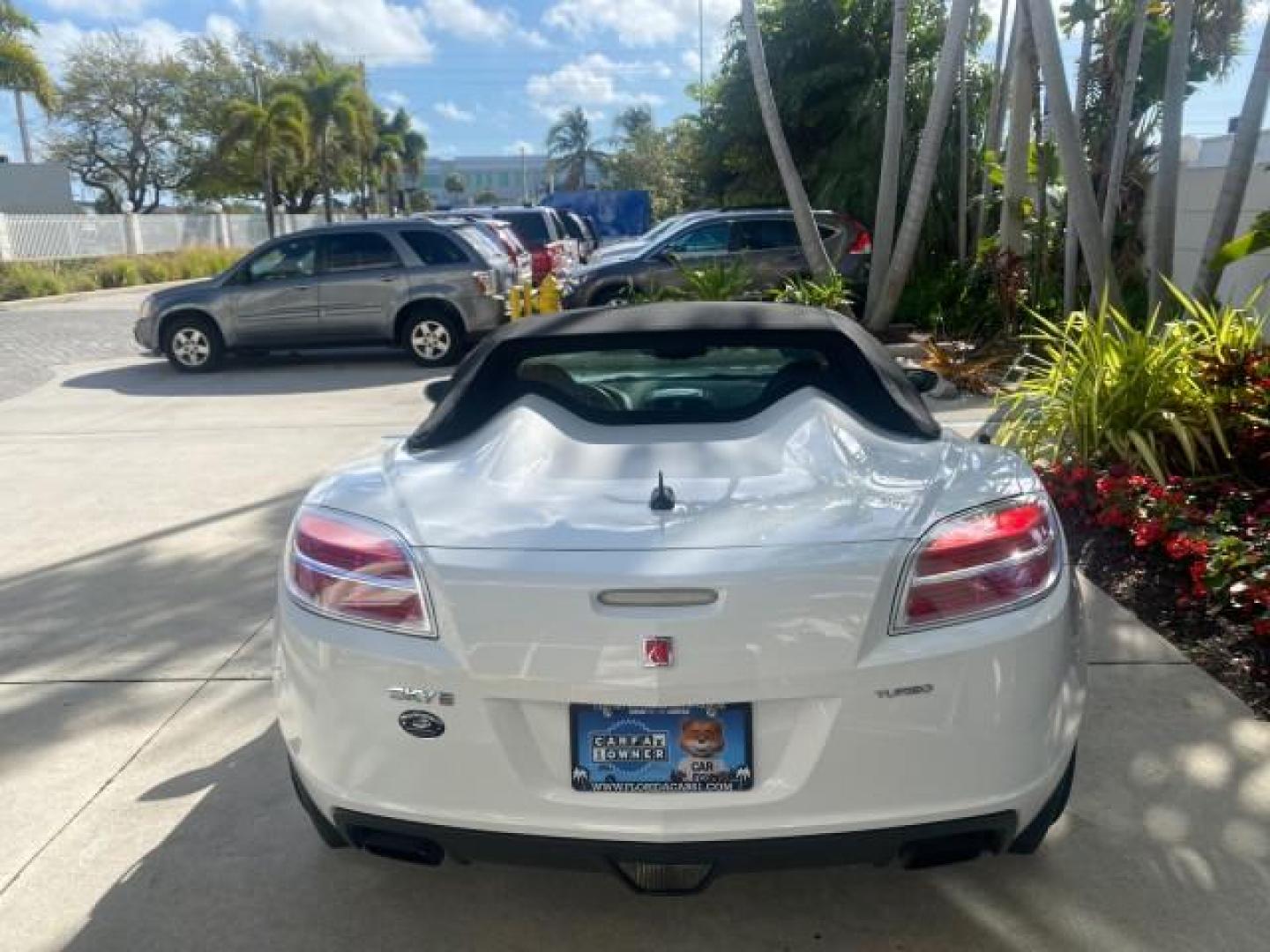 2008 Polar White /Black Saturn Sky Red Line LOW MILES 29,810 SOFT TOP (1G8MF35X78Y) with an Turbocharged And Intercooled Ecotec 2.0L VVT DOHC 4-Cyl Aluminum Engine engine, Automatic transmission, located at 4701 North Dixie Hwy, Pompano Beach, FL, 33064, (954) 422-2889, 26.240938, -80.123474 - OUR WEBPAGE FLORIDACARS1.COM HAS OVER 100 PHOTOS AND FREE CARFAX LINK 2008 SATURN SKY RED LINE TOP OF THE LINE TURBO FAST VIN: 1G8MF35X78Y121221 1 G 8 M F 3 5 X 7 8 Y 1 2 1 2 2 1 CONVERTIBLE 2.0L I4 F DOHC GASOLINE 31 MPG REAR WHEEL DRIVE Features ABS Brakes Air Conditioning Alloy Wheels AM/FM Stere - Photo#35