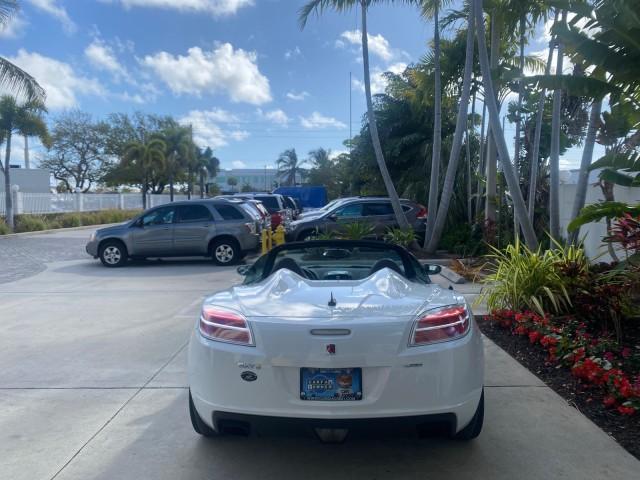 2008 Polar White /Black Saturn Sky Red Line LOW MILES 29,810 SOFT TOP (1G8MF35X78Y) with an Turbocharged And Intercooled Ecotec 2.0L VVT DOHC 4-Cyl Aluminum Engine engine, Automatic transmission, located at 4701 North Dixie Hwy, Pompano Beach, FL, 33064, (954) 422-2889, 26.240938, -80.123474 - OUR WEBPAGE FLORIDACARS1.COM HAS OVER 100 PHOTOS AND FREE CARFAX LINK 2008 SATURN SKY RED LINE TOP OF THE LINE TURBO FAST VIN: 1G8MF35X78Y121221 1 G 8 M F 3 5 X 7 8 Y 1 2 1 2 2 1 CONVERTIBLE 2.0L I4 F DOHC GASOLINE 31 MPG REAR WHEEL DRIVE Features ABS Brakes Air Conditioning Alloy Wheels AM/FM Stere - Photo#44