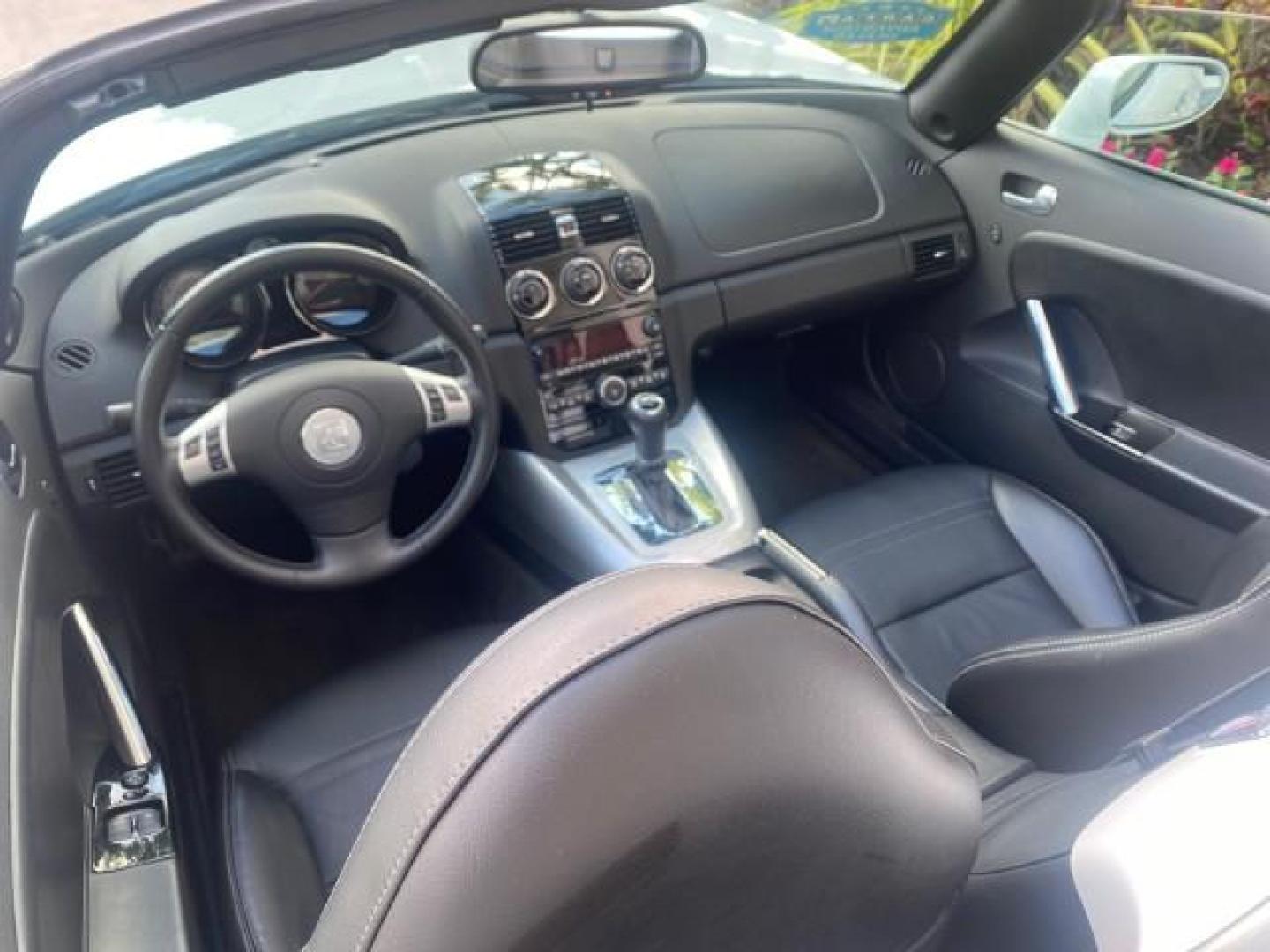 2008 Polar White /Black Saturn Sky Red Line LOW MILES 29,810 SOFT TOP (1G8MF35X78Y) with an Turbocharged And Intercooled Ecotec 2.0L VVT DOHC 4-Cyl Aluminum Engine engine, Automatic transmission, located at 4701 North Dixie Hwy, Pompano Beach, FL, 33064, (954) 422-2889, 26.240938, -80.123474 - OUR WEBPAGE FLORIDACARS1.COM HAS OVER 100 PHOTOS AND FREE CARFAX LINK 2008 SATURN SKY RED LINE TOP OF THE LINE TURBO FAST VIN: 1G8MF35X78Y121221 1 G 8 M F 3 5 X 7 8 Y 1 2 1 2 2 1 CONVERTIBLE 2.0L I4 F DOHC GASOLINE 31 MPG REAR WHEEL DRIVE Features ABS Brakes Air Conditioning Alloy Wheels AM/FM Stere - Photo#48