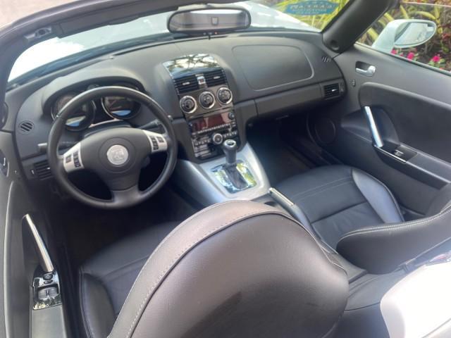 2008 Polar White /Black Saturn Sky Red Line LOW MILES 29,810 SOFT TOP (1G8MF35X78Y) with an Turbocharged And Intercooled Ecotec 2.0L VVT DOHC 4-Cyl Aluminum Engine engine, Automatic transmission, located at 4701 North Dixie Hwy, Pompano Beach, FL, 33064, (954) 422-2889, 26.240938, -80.123474 - OUR WEBPAGE FLORIDACARS1.COM HAS OVER 100 PHOTOS AND FREE CARFAX LINK 2008 SATURN SKY RED LINE TOP OF THE LINE TURBO FAST VIN: 1G8MF35X78Y121221 1 G 8 M F 3 5 X 7 8 Y 1 2 1 2 2 1 CONVERTIBLE 2.0L I4 F DOHC GASOLINE 31 MPG REAR WHEEL DRIVE Features ABS Brakes Air Conditioning Alloy Wheels AM/FM Stere - Photo#48