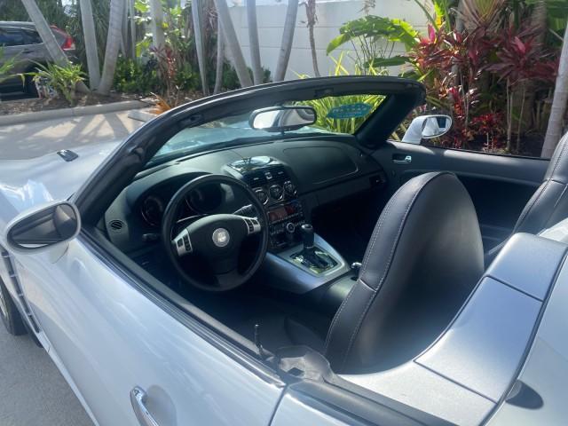 2008 Polar White /Black Saturn Sky Red Line LOW MILES 29,810 SOFT TOP (1G8MF35X78Y) with an Turbocharged And Intercooled Ecotec 2.0L VVT DOHC 4-Cyl Aluminum Engine engine, Automatic transmission, located at 4701 North Dixie Hwy, Pompano Beach, FL, 33064, (954) 422-2889, 26.240938, -80.123474 - OUR WEBPAGE FLORIDACARS1.COM HAS OVER 100 PHOTOS AND FREE CARFAX LINK 2008 SATURN SKY RED LINE TOP OF THE LINE TURBO FAST VIN: 1G8MF35X78Y121221 1 G 8 M F 3 5 X 7 8 Y 1 2 1 2 2 1 CONVERTIBLE 2.0L I4 F DOHC GASOLINE 31 MPG REAR WHEEL DRIVE Features ABS Brakes Air Conditioning Alloy Wheels AM/FM Stere - Photo#50