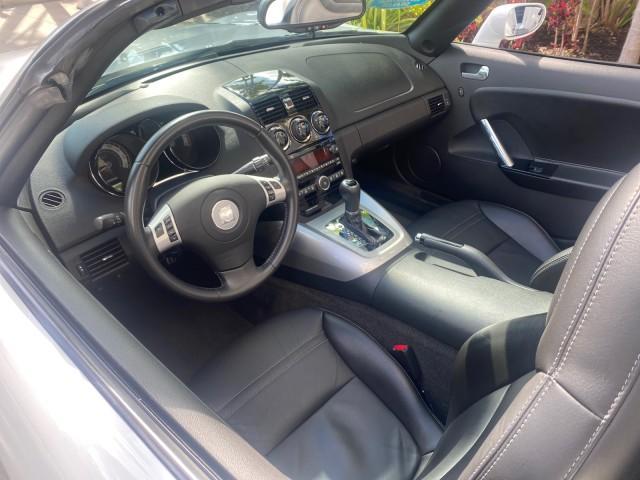 2008 Polar White /Black Saturn Sky Red Line LOW MILES 29,810 SOFT TOP (1G8MF35X78Y) with an Turbocharged And Intercooled Ecotec 2.0L VVT DOHC 4-Cyl Aluminum Engine engine, Automatic transmission, located at 4701 North Dixie Hwy, Pompano Beach, FL, 33064, (954) 422-2889, 26.240938, -80.123474 - OUR WEBPAGE FLORIDACARS1.COM HAS OVER 100 PHOTOS AND FREE CARFAX LINK 2008 SATURN SKY RED LINE TOP OF THE LINE TURBO FAST VIN: 1G8MF35X78Y121221 1 G 8 M F 3 5 X 7 8 Y 1 2 1 2 2 1 CONVERTIBLE 2.0L I4 F DOHC GASOLINE 31 MPG REAR WHEEL DRIVE Features ABS Brakes Air Conditioning Alloy Wheels AM/FM Stere - Photo#51