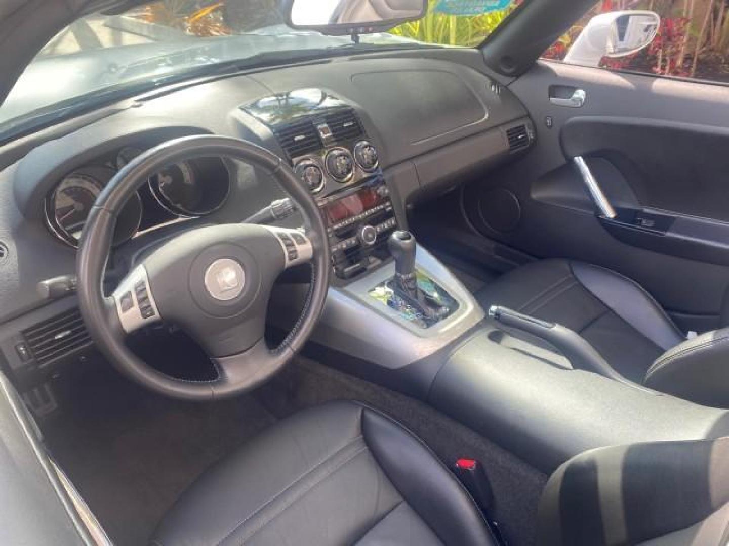 2008 Polar White /Black Saturn Sky Red Line LOW MILES 29,810 SOFT TOP (1G8MF35X78Y) with an Turbocharged And Intercooled Ecotec 2.0L VVT DOHC 4-Cyl Aluminum Engine engine, Automatic transmission, located at 4701 North Dixie Hwy, Pompano Beach, FL, 33064, (954) 422-2889, 26.240938, -80.123474 - OUR WEBPAGE FLORIDACARS1.COM HAS OVER 100 PHOTOS AND FREE CARFAX LINK 2008 SATURN SKY RED LINE TOP OF THE LINE TURBO FAST VIN: 1G8MF35X78Y121221 1 G 8 M F 3 5 X 7 8 Y 1 2 1 2 2 1 CONVERTIBLE 2.0L I4 F DOHC GASOLINE 31 MPG REAR WHEEL DRIVE Features ABS Brakes Air Conditioning Alloy Wheels AM/FM Stere - Photo#52