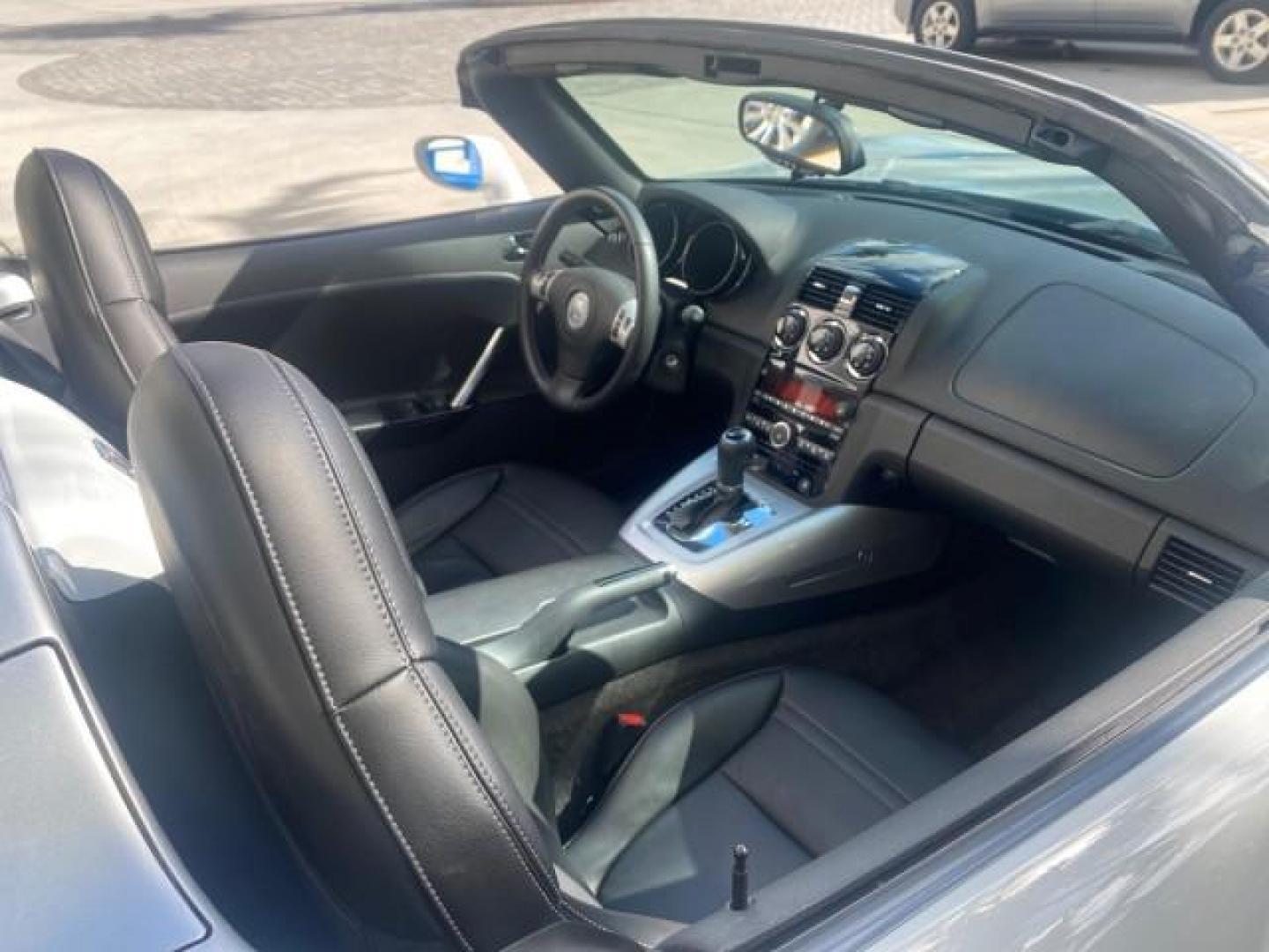 2008 Polar White /Black Saturn Sky Red Line LOW MILES 29,810 SOFT TOP (1G8MF35X78Y) with an Turbocharged And Intercooled Ecotec 2.0L VVT DOHC 4-Cyl Aluminum Engine engine, Automatic transmission, located at 4701 North Dixie Hwy, Pompano Beach, FL, 33064, (954) 422-2889, 26.240938, -80.123474 - OUR WEBPAGE FLORIDACARS1.COM HAS OVER 100 PHOTOS AND FREE CARFAX LINK 2008 SATURN SKY RED LINE TOP OF THE LINE TURBO FAST VIN: 1G8MF35X78Y121221 1 G 8 M F 3 5 X 7 8 Y 1 2 1 2 2 1 CONVERTIBLE 2.0L I4 F DOHC GASOLINE 31 MPG REAR WHEEL DRIVE Features ABS Brakes Air Conditioning Alloy Wheels AM/FM Stere - Photo#53