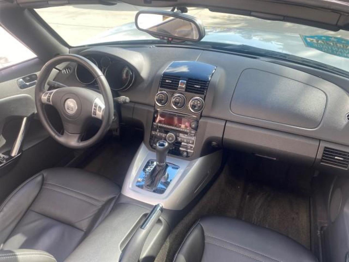 2008 Polar White /Black Saturn Sky Red Line LOW MILES 29,810 SOFT TOP (1G8MF35X78Y) with an Turbocharged And Intercooled Ecotec 2.0L VVT DOHC 4-Cyl Aluminum Engine engine, Automatic transmission, located at 4701 North Dixie Hwy, Pompano Beach, FL, 33064, (954) 422-2889, 26.240938, -80.123474 - OUR WEBPAGE FLORIDACARS1.COM HAS OVER 100 PHOTOS AND FREE CARFAX LINK 2008 SATURN SKY RED LINE TOP OF THE LINE TURBO FAST VIN: 1G8MF35X78Y121221 1 G 8 M F 3 5 X 7 8 Y 1 2 1 2 2 1 CONVERTIBLE 2.0L I4 F DOHC GASOLINE 31 MPG REAR WHEEL DRIVE Features ABS Brakes Air Conditioning Alloy Wheels AM/FM Stere - Photo#56