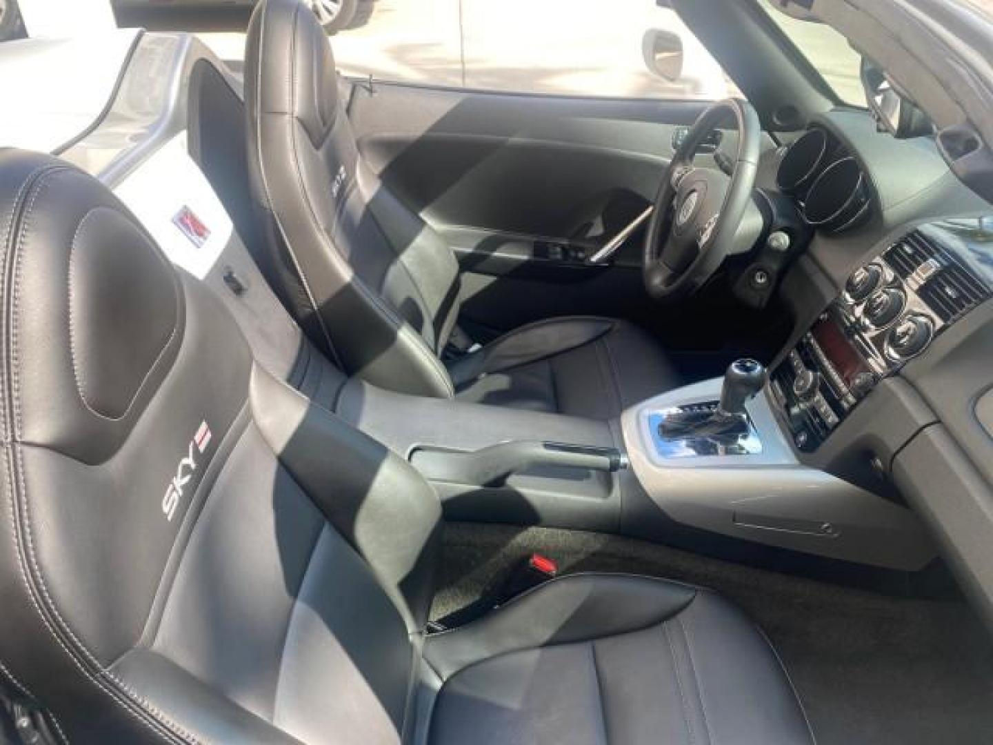 2008 Polar White /Black Saturn Sky Red Line LOW MILES 29,810 SOFT TOP (1G8MF35X78Y) with an Turbocharged And Intercooled Ecotec 2.0L VVT DOHC 4-Cyl Aluminum Engine engine, Automatic transmission, located at 4701 North Dixie Hwy, Pompano Beach, FL, 33064, (954) 422-2889, 26.240938, -80.123474 - OUR WEBPAGE FLORIDACARS1.COM HAS OVER 100 PHOTOS AND FREE CARFAX LINK 2008 SATURN SKY RED LINE TOP OF THE LINE TURBO FAST VIN: 1G8MF35X78Y121221 1 G 8 M F 3 5 X 7 8 Y 1 2 1 2 2 1 CONVERTIBLE 2.0L I4 F DOHC GASOLINE 31 MPG REAR WHEEL DRIVE Features ABS Brakes Air Conditioning Alloy Wheels AM/FM Stere - Photo#57