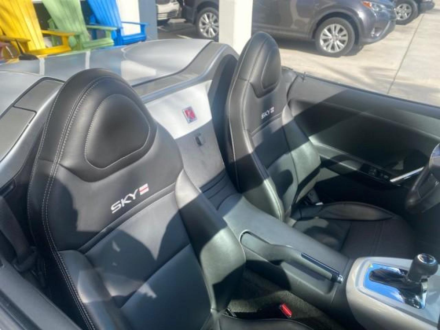 2008 Polar White /Black Saturn Sky Red Line LOW MILES 29,810 SOFT TOP (1G8MF35X78Y) with an Turbocharged And Intercooled Ecotec 2.0L VVT DOHC 4-Cyl Aluminum Engine engine, Automatic transmission, located at 4701 North Dixie Hwy, Pompano Beach, FL, 33064, (954) 422-2889, 26.240938, -80.123474 - OUR WEBPAGE FLORIDACARS1.COM HAS OVER 100 PHOTOS AND FREE CARFAX LINK 2008 SATURN SKY RED LINE TOP OF THE LINE TURBO FAST VIN: 1G8MF35X78Y121221 1 G 8 M F 3 5 X 7 8 Y 1 2 1 2 2 1 CONVERTIBLE 2.0L I4 F DOHC GASOLINE 31 MPG REAR WHEEL DRIVE Features ABS Brakes Air Conditioning Alloy Wheels AM/FM Stere - Photo#58