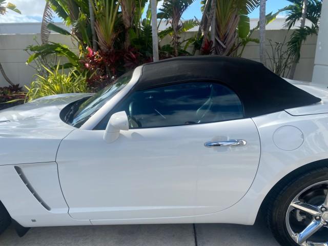2008 Polar White /Black Saturn Sky Red Line LOW MILES 29,810 SOFT TOP (1G8MF35X78Y) with an Turbocharged And Intercooled Ecotec 2.0L VVT DOHC 4-Cyl Aluminum Engine engine, Automatic transmission, located at 4701 North Dixie Hwy, Pompano Beach, FL, 33064, (954) 422-2889, 26.240938, -80.123474 - OUR WEBPAGE FLORIDACARS1.COM HAS OVER 100 PHOTOS AND FREE CARFAX LINK 2008 SATURN SKY RED LINE TOP OF THE LINE TURBO FAST VIN: 1G8MF35X78Y121221 1 G 8 M F 3 5 X 7 8 Y 1 2 1 2 2 1 CONVERTIBLE 2.0L I4 F DOHC GASOLINE 31 MPG REAR WHEEL DRIVE Features ABS Brakes Air Conditioning Alloy Wheels AM/FM Stere - Photo#59