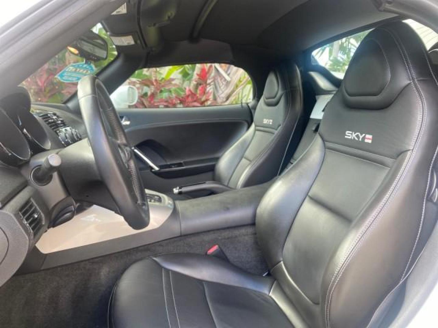 2008 Polar White /Black Saturn Sky Red Line LOW MILES 29,810 SOFT TOP (1G8MF35X78Y) with an Turbocharged And Intercooled Ecotec 2.0L VVT DOHC 4-Cyl Aluminum Engine engine, Automatic transmission, located at 4701 North Dixie Hwy, Pompano Beach, FL, 33064, (954) 422-2889, 26.240938, -80.123474 - OUR WEBPAGE FLORIDACARS1.COM HAS OVER 100 PHOTOS AND FREE CARFAX LINK 2008 SATURN SKY RED LINE TOP OF THE LINE TURBO FAST VIN: 1G8MF35X78Y121221 1 G 8 M F 3 5 X 7 8 Y 1 2 1 2 2 1 CONVERTIBLE 2.0L I4 F DOHC GASOLINE 31 MPG REAR WHEEL DRIVE Features ABS Brakes Air Conditioning Alloy Wheels AM/FM Stere - Photo#66