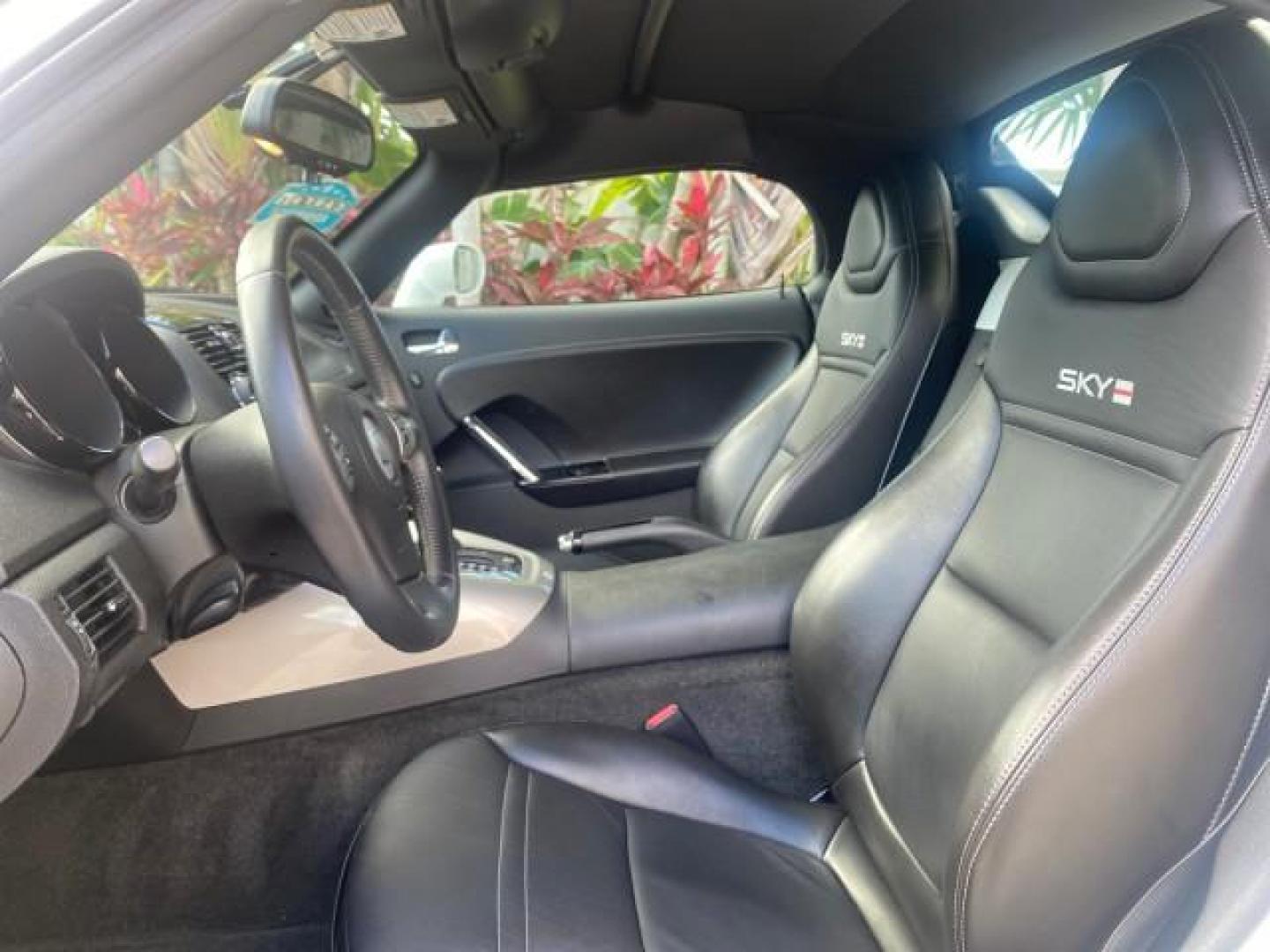 2008 Polar White /Black Saturn Sky Red Line LOW MILES 29,810 SOFT TOP (1G8MF35X78Y) with an Turbocharged And Intercooled Ecotec 2.0L VVT DOHC 4-Cyl Aluminum Engine engine, Automatic transmission, located at 4701 North Dixie Hwy, Pompano Beach, FL, 33064, (954) 422-2889, 26.240938, -80.123474 - OUR WEBPAGE FLORIDACARS1.COM HAS OVER 100 PHOTOS AND FREE CARFAX LINK 2008 SATURN SKY RED LINE TOP OF THE LINE TURBO FAST VIN: 1G8MF35X78Y121221 1 G 8 M F 3 5 X 7 8 Y 1 2 1 2 2 1 CONVERTIBLE 2.0L I4 F DOHC GASOLINE 31 MPG REAR WHEEL DRIVE Features ABS Brakes Air Conditioning Alloy Wheels AM/FM Stere - Photo#67