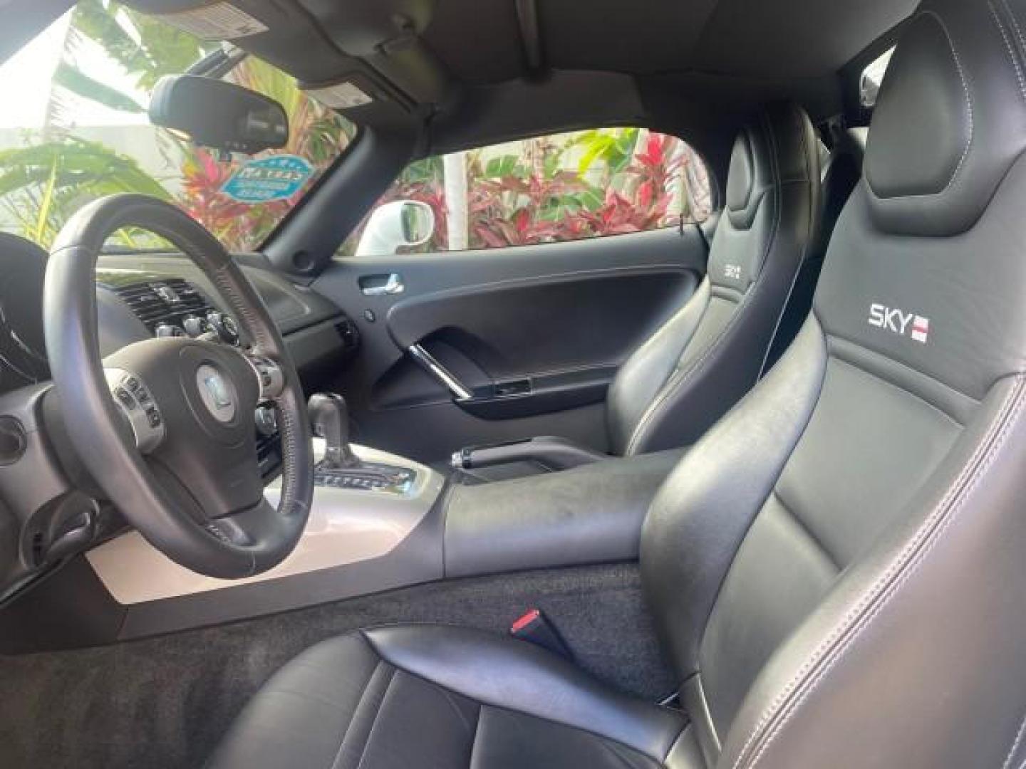 2008 Polar White /Black Saturn Sky Red Line LOW MILES 29,810 SOFT TOP (1G8MF35X78Y) with an Turbocharged And Intercooled Ecotec 2.0L VVT DOHC 4-Cyl Aluminum Engine engine, Automatic transmission, located at 4701 North Dixie Hwy, Pompano Beach, FL, 33064, (954) 422-2889, 26.240938, -80.123474 - OUR WEBPAGE FLORIDACARS1.COM HAS OVER 100 PHOTOS AND FREE CARFAX LINK 2008 SATURN SKY RED LINE TOP OF THE LINE TURBO FAST VIN: 1G8MF35X78Y121221 1 G 8 M F 3 5 X 7 8 Y 1 2 1 2 2 1 CONVERTIBLE 2.0L I4 F DOHC GASOLINE 31 MPG REAR WHEEL DRIVE Features ABS Brakes Air Conditioning Alloy Wheels AM/FM Stere - Photo#68