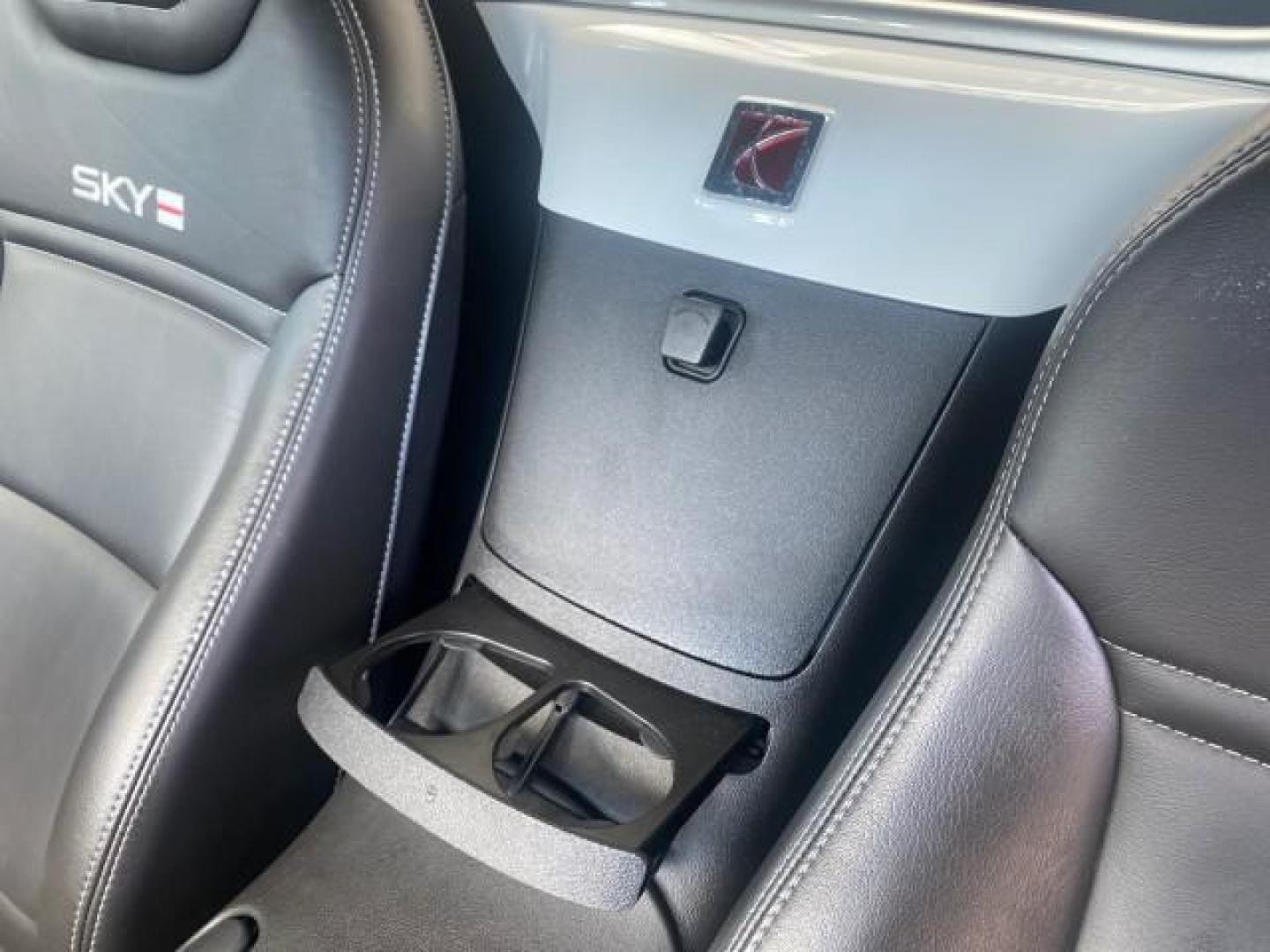 2008 Polar White /Black Saturn Sky Red Line LOW MILES 29,810 SOFT TOP (1G8MF35X78Y) with an Turbocharged And Intercooled Ecotec 2.0L VVT DOHC 4-Cyl Aluminum Engine engine, Automatic transmission, located at 4701 North Dixie Hwy, Pompano Beach, FL, 33064, (954) 422-2889, 26.240938, -80.123474 - OUR WEBPAGE FLORIDACARS1.COM HAS OVER 100 PHOTOS AND FREE CARFAX LINK 2008 SATURN SKY RED LINE TOP OF THE LINE TURBO FAST VIN: 1G8MF35X78Y121221 1 G 8 M F 3 5 X 7 8 Y 1 2 1 2 2 1 CONVERTIBLE 2.0L I4 F DOHC GASOLINE 31 MPG REAR WHEEL DRIVE Features ABS Brakes Air Conditioning Alloy Wheels AM/FM Stere - Photo#89