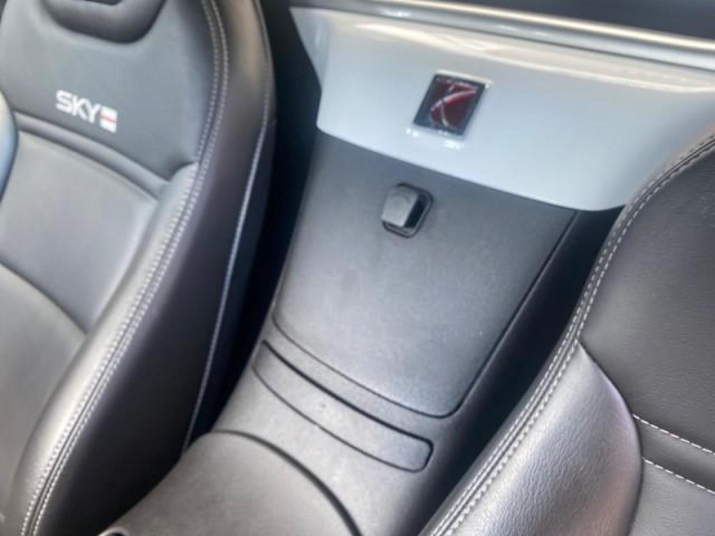 2008 Polar White /Black Saturn Sky Red Line LOW MILES 29,810 SOFT TOP (1G8MF35X78Y) with an Turbocharged And Intercooled Ecotec 2.0L VVT DOHC 4-Cyl Aluminum Engine engine, Automatic transmission, located at 4701 North Dixie Hwy, Pompano Beach, FL, 33064, (954) 422-2889, 26.240938, -80.123474 - OUR WEBPAGE FLORIDACARS1.COM HAS OVER 100 PHOTOS AND FREE CARFAX LINK 2008 SATURN SKY RED LINE TOP OF THE LINE TURBO FAST VIN: 1G8MF35X78Y121221 1 G 8 M F 3 5 X 7 8 Y 1 2 1 2 2 1 CONVERTIBLE 2.0L I4 F DOHC GASOLINE 31 MPG REAR WHEEL DRIVE Features ABS Brakes Air Conditioning Alloy Wheels AM/FM Stere - Photo#90