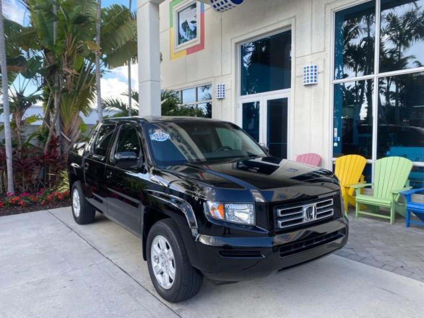 2007 Formal Black /Gray Honda Ridgeline RTL w/Leather 1 OWNER FL (2HJYK16557H) with an 3.5L SOHC PGM-FI 24-Valve VTEC V6 Engine engine, Automatic transmission, located at 4701 North Dixie Hwy, Pompano Beach, FL, 33064, (954) 422-2889, 26.240938, -80.123474 - OUR WEBPAGE FLORIDACARS1.COM HAS OVER 100 PHOTOS AND FREE CARFAX LINK 2007 HONDA RIDGELINE RTL 1 OWNER NEW $35,535 VIN: 2HJYK16557H543559 2 H J Y K 1 6 5 5 7 H 5 4 3 5 5 9 CREW PICKUP 3.5L V6 F SOHC 24V GASOLINE 21 MPG FRONT WHEEL DRIVE W/ 4X4 Features ABS Brakes Air Conditioning Alloy Wheels AM/FM - Photo#1