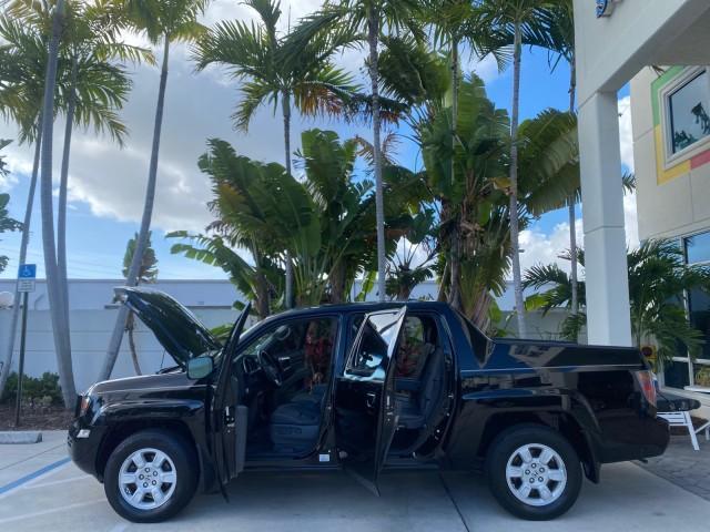 2007 Formal Black /Gray Honda Ridgeline RTL w/Leather 1 OWNER FL (2HJYK16557H) with an 3.5L SOHC PGM-FI 24-Valve VTEC V6 Engine engine, Automatic transmission, located at 4701 North Dixie Hwy, Pompano Beach, FL, 33064, (954) 422-2889, 26.240938, -80.123474 - OUR WEBPAGE FLORIDACARS1.COM HAS OVER 100 PHOTOS AND FREE CARFAX LINK 2007 HONDA RIDGELINE RTL 1 OWNER NEW $35,535 VIN: 2HJYK16557H543559 2 H J Y K 1 6 5 5 7 H 5 4 3 5 5 9 CREW PICKUP 3.5L V6 F SOHC 24V GASOLINE 21 MPG FRONT WHEEL DRIVE W/ 4X4 Features ABS Brakes Air Conditioning Alloy Wheels AM/FM - Photo#8
