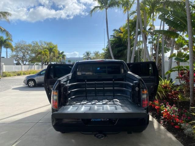 2007 Formal Black /Gray Honda Ridgeline RTL w/Leather 1 OWNER FL (2HJYK16557H) with an 3.5L SOHC PGM-FI 24-Valve VTEC V6 Engine engine, Automatic transmission, located at 4701 North Dixie Hwy, Pompano Beach, FL, 33064, (954) 422-2889, 26.240938, -80.123474 - OUR WEBPAGE FLORIDACARS1.COM HAS OVER 100 PHOTOS AND FREE CARFAX LINK 2007 HONDA RIDGELINE RTL 1 OWNER NEW $35,535 VIN: 2HJYK16557H543559 2 H J Y K 1 6 5 5 7 H 5 4 3 5 5 9 CREW PICKUP 3.5L V6 F SOHC 24V GASOLINE 21 MPG FRONT WHEEL DRIVE W/ 4X4 Features ABS Brakes Air Conditioning Alloy Wheels AM/FM - Photo#15