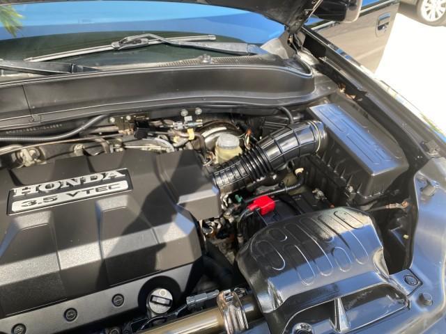 2007 Formal Black /Gray Honda Ridgeline RTL w/Leather 1 OWNER FL (2HJYK16557H) with an 3.5L SOHC PGM-FI 24-Valve VTEC V6 Engine engine, Automatic transmission, located at 4701 North Dixie Hwy, Pompano Beach, FL, 33064, (954) 422-2889, 26.240938, -80.123474 - OUR WEBPAGE FLORIDACARS1.COM HAS OVER 100 PHOTOS AND FREE CARFAX LINK 2007 HONDA RIDGELINE RTL 1 OWNER NEW $35,535 VIN: 2HJYK16557H543559 2 H J Y K 1 6 5 5 7 H 5 4 3 5 5 9 CREW PICKUP 3.5L V6 F SOHC 24V GASOLINE 21 MPG FRONT WHEEL DRIVE W/ 4X4 Features ABS Brakes Air Conditioning Alloy Wheels AM/FM - Photo#26