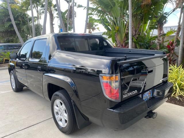 2007 Formal Black /Gray Honda Ridgeline RTL w/Leather 1 OWNER FL (2HJYK16557H) with an 3.5L SOHC PGM-FI 24-Valve VTEC V6 Engine engine, Automatic transmission, located at 4701 North Dixie Hwy, Pompano Beach, FL, 33064, (954) 422-2889, 26.240938, -80.123474 - OUR WEBPAGE FLORIDACARS1.COM HAS OVER 100 PHOTOS AND FREE CARFAX LINK 2007 HONDA RIDGELINE RTL 1 OWNER NEW $35,535 VIN: 2HJYK16557H543559 2 H J Y K 1 6 5 5 7 H 5 4 3 5 5 9 CREW PICKUP 3.5L V6 F SOHC 24V GASOLINE 21 MPG FRONT WHEEL DRIVE W/ 4X4 Features ABS Brakes Air Conditioning Alloy Wheels AM/FM - Photo#34