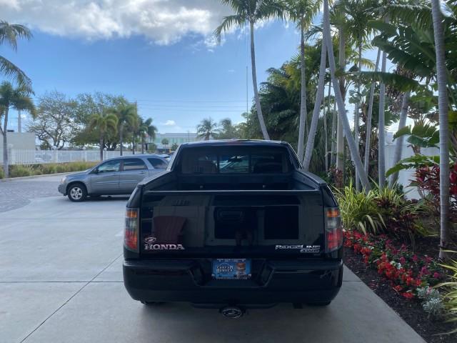 2007 Formal Black /Gray Honda Ridgeline RTL w/Leather 1 OWNER FL (2HJYK16557H) with an 3.5L SOHC PGM-FI 24-Valve VTEC V6 Engine engine, Automatic transmission, located at 4701 North Dixie Hwy, Pompano Beach, FL, 33064, (954) 422-2889, 26.240938, -80.123474 - OUR WEBPAGE FLORIDACARS1.COM HAS OVER 100 PHOTOS AND FREE CARFAX LINK 2007 HONDA RIDGELINE RTL 1 OWNER NEW $35,535 VIN: 2HJYK16557H543559 2 H J Y K 1 6 5 5 7 H 5 4 3 5 5 9 CREW PICKUP 3.5L V6 F SOHC 24V GASOLINE 21 MPG FRONT WHEEL DRIVE W/ 4X4 Features ABS Brakes Air Conditioning Alloy Wheels AM/FM - Photo#35