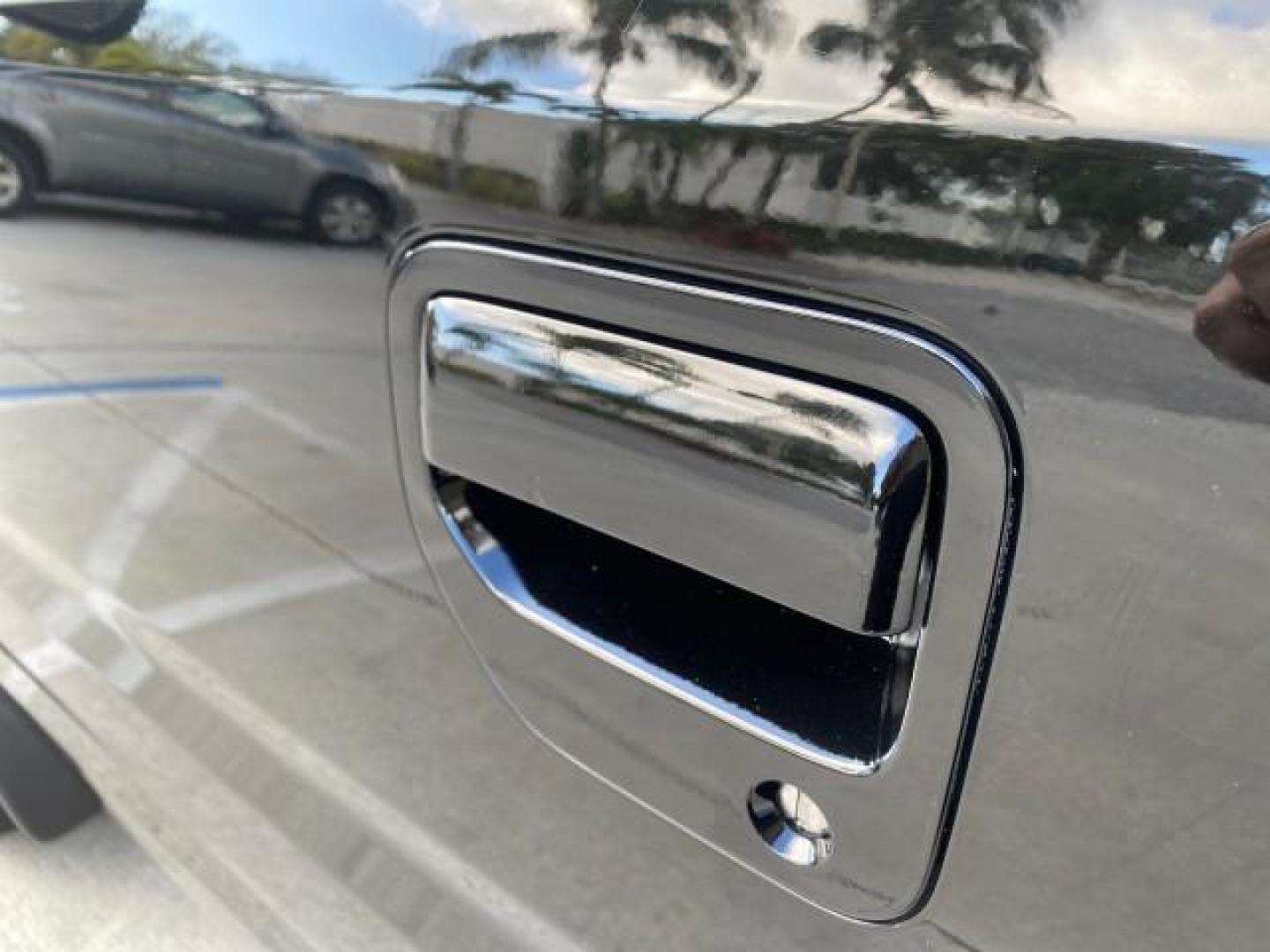 2007 Formal Black /Gray Honda Ridgeline RTL w/Leather 1 OWNER FL (2HJYK16557H) with an 3.5L SOHC PGM-FI 24-Valve VTEC V6 Engine engine, Automatic transmission, located at 4701 North Dixie Hwy, Pompano Beach, FL, 33064, (954) 422-2889, 26.240938, -80.123474 - OUR WEBPAGE FLORIDACARS1.COM HAS OVER 100 PHOTOS AND FREE CARFAX LINK 2007 HONDA RIDGELINE RTL 1 OWNER NEW $35,535 VIN: 2HJYK16557H543559 2 H J Y K 1 6 5 5 7 H 5 4 3 5 5 9 CREW PICKUP 3.5L V6 F SOHC 24V GASOLINE 21 MPG FRONT WHEEL DRIVE W/ 4X4 Features ABS Brakes Air Conditioning Alloy Wheels AM/FM - Photo#39