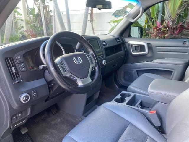 2007 Formal Black /Gray Honda Ridgeline RTL w/Leather 1 OWNER FL (2HJYK16557H) with an 3.5L SOHC PGM-FI 24-Valve VTEC V6 Engine engine, Automatic transmission, located at 4701 North Dixie Hwy, Pompano Beach, FL, 33064, (954) 422-2889, 26.240938, -80.123474 - OUR WEBPAGE FLORIDACARS1.COM HAS OVER 100 PHOTOS AND FREE CARFAX LINK 2007 HONDA RIDGELINE RTL 1 OWNER NEW $35,535 VIN: 2HJYK16557H543559 2 H J Y K 1 6 5 5 7 H 5 4 3 5 5 9 CREW PICKUP 3.5L V6 F SOHC 24V GASOLINE 21 MPG FRONT WHEEL DRIVE W/ 4X4 Features ABS Brakes Air Conditioning Alloy Wheels AM/FM - Photo#47
