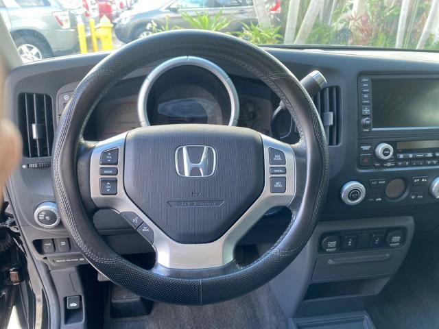 2007 Formal Black /Gray Honda Ridgeline RTL w/Leather 1 OWNER FL (2HJYK16557H) with an 3.5L SOHC PGM-FI 24-Valve VTEC V6 Engine engine, Automatic transmission, located at 4701 North Dixie Hwy, Pompano Beach, FL, 33064, (954) 422-2889, 26.240938, -80.123474 - OUR WEBPAGE FLORIDACARS1.COM HAS OVER 100 PHOTOS AND FREE CARFAX LINK 2007 HONDA RIDGELINE RTL 1 OWNER NEW $35,535 VIN: 2HJYK16557H543559 2 H J Y K 1 6 5 5 7 H 5 4 3 5 5 9 CREW PICKUP 3.5L V6 F SOHC 24V GASOLINE 21 MPG FRONT WHEEL DRIVE W/ 4X4 Features ABS Brakes Air Conditioning Alloy Wheels AM/FM - Photo#49