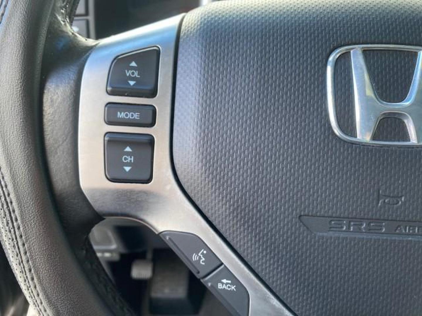 2007 Formal Black /Gray Honda Ridgeline RTL w/Leather 1 OWNER FL (2HJYK16557H) with an 3.5L SOHC PGM-FI 24-Valve VTEC V6 Engine engine, Automatic transmission, located at 4701 North Dixie Hwy, Pompano Beach, FL, 33064, (954) 422-2889, 26.240938, -80.123474 - OUR WEBPAGE FLORIDACARS1.COM HAS OVER 100 PHOTOS AND FREE CARFAX LINK 2007 HONDA RIDGELINE RTL 1 OWNER NEW $35,535 VIN: 2HJYK16557H543559 2 H J Y K 1 6 5 5 7 H 5 4 3 5 5 9 CREW PICKUP 3.5L V6 F SOHC 24V GASOLINE 21 MPG FRONT WHEEL DRIVE W/ 4X4 Features ABS Brakes Air Conditioning Alloy Wheels AM/FM - Photo#50