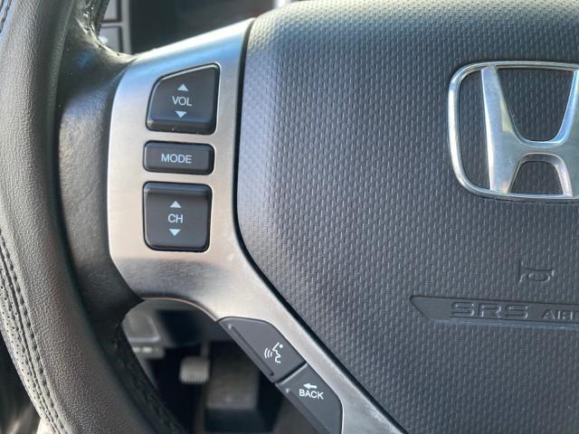 2007 Formal Black /Gray Honda Ridgeline RTL w/Leather 1 OWNER FL (2HJYK16557H) with an 3.5L SOHC PGM-FI 24-Valve VTEC V6 Engine engine, Automatic transmission, located at 4701 North Dixie Hwy, Pompano Beach, FL, 33064, (954) 422-2889, 26.240938, -80.123474 - OUR WEBPAGE FLORIDACARS1.COM HAS OVER 100 PHOTOS AND FREE CARFAX LINK 2007 HONDA RIDGELINE RTL 1 OWNER NEW $35,535 VIN: 2HJYK16557H543559 2 H J Y K 1 6 5 5 7 H 5 4 3 5 5 9 CREW PICKUP 3.5L V6 F SOHC 24V GASOLINE 21 MPG FRONT WHEEL DRIVE W/ 4X4 Features ABS Brakes Air Conditioning Alloy Wheels AM/FM - Photo#50