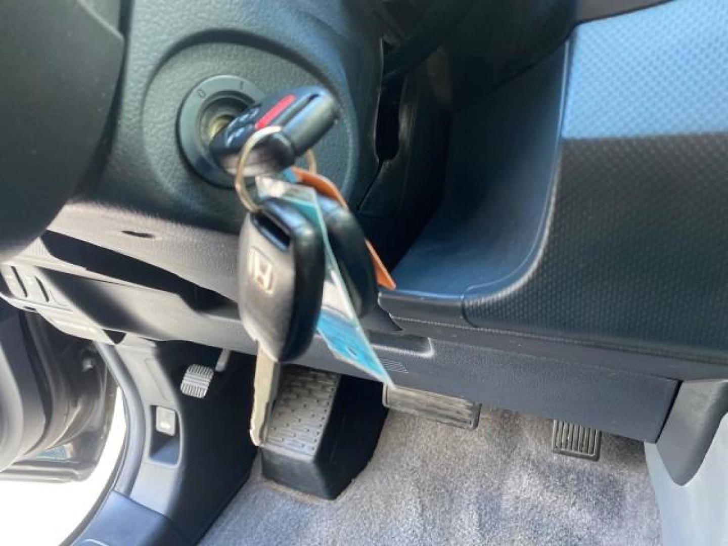 2007 Formal Black /Gray Honda Ridgeline RTL w/Leather 1 OWNER FL (2HJYK16557H) with an 3.5L SOHC PGM-FI 24-Valve VTEC V6 Engine engine, Automatic transmission, located at 4701 North Dixie Hwy, Pompano Beach, FL, 33064, (954) 422-2889, 26.240938, -80.123474 - OUR WEBPAGE FLORIDACARS1.COM HAS OVER 100 PHOTOS AND FREE CARFAX LINK 2007 HONDA RIDGELINE RTL 1 OWNER NEW $35,535 VIN: 2HJYK16557H543559 2 H J Y K 1 6 5 5 7 H 5 4 3 5 5 9 CREW PICKUP 3.5L V6 F SOHC 24V GASOLINE 21 MPG FRONT WHEEL DRIVE W/ 4X4 Features ABS Brakes Air Conditioning Alloy Wheels AM/FM - Photo#57