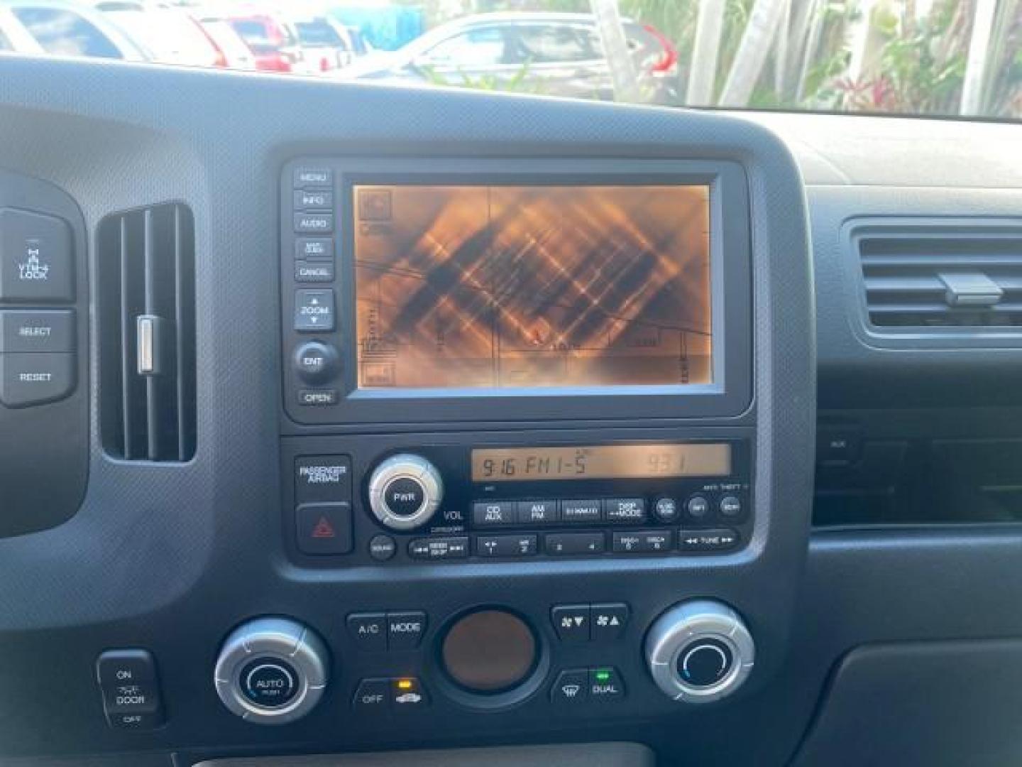 2007 Formal Black /Gray Honda Ridgeline RTL w/Leather 1 OWNER FL (2HJYK16557H) with an 3.5L SOHC PGM-FI 24-Valve VTEC V6 Engine engine, Automatic transmission, located at 4701 North Dixie Hwy, Pompano Beach, FL, 33064, (954) 422-2889, 26.240938, -80.123474 - OUR WEBPAGE FLORIDACARS1.COM HAS OVER 100 PHOTOS AND FREE CARFAX LINK 2007 HONDA RIDGELINE RTL 1 OWNER NEW $35,535 VIN: 2HJYK16557H543559 2 H J Y K 1 6 5 5 7 H 5 4 3 5 5 9 CREW PICKUP 3.5L V6 F SOHC 24V GASOLINE 21 MPG FRONT WHEEL DRIVE W/ 4X4 Features ABS Brakes Air Conditioning Alloy Wheels AM/FM - Photo#59