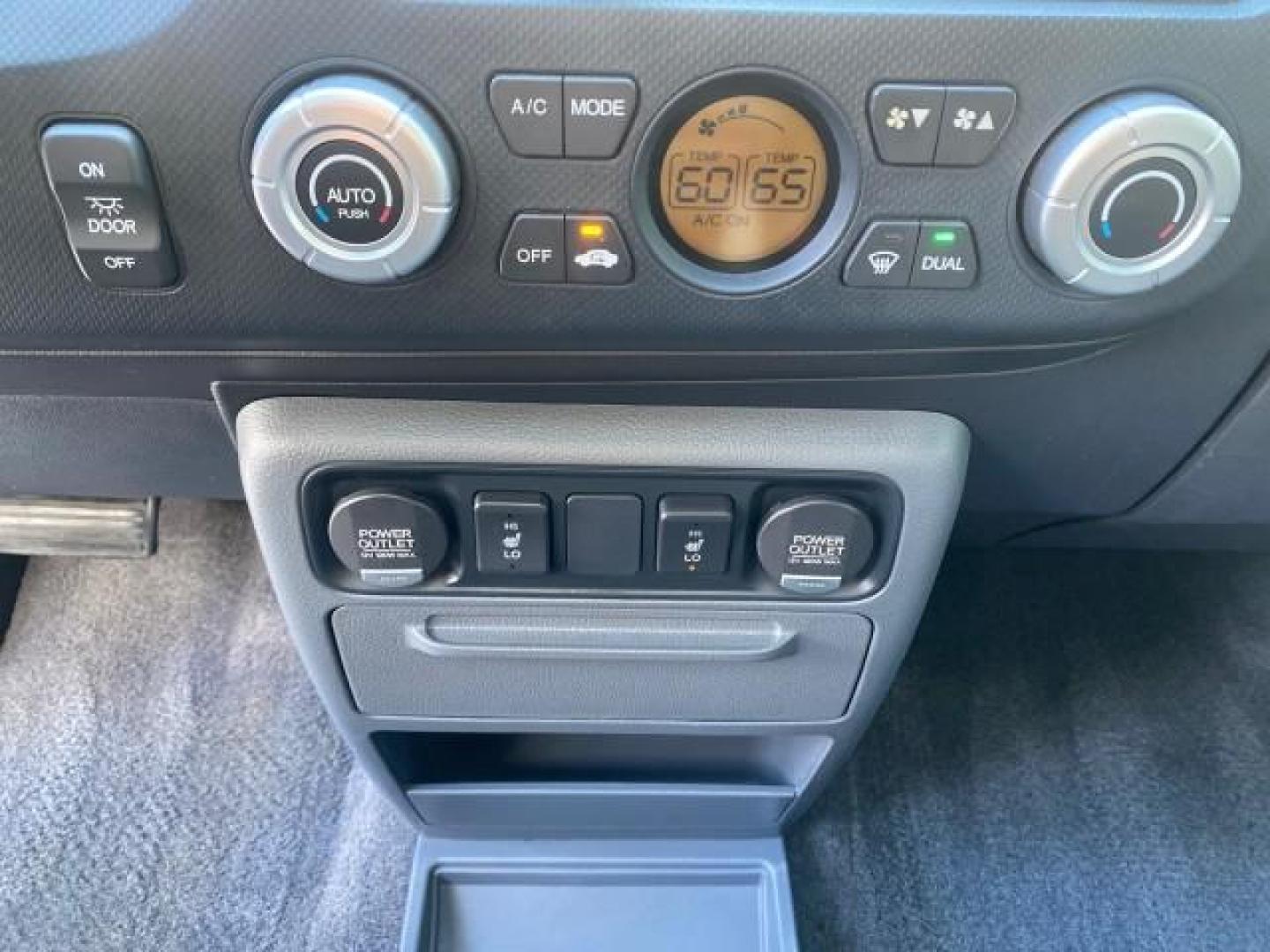 2007 Formal Black /Gray Honda Ridgeline RTL w/Leather 1 OWNER FL (2HJYK16557H) with an 3.5L SOHC PGM-FI 24-Valve VTEC V6 Engine engine, Automatic transmission, located at 4701 North Dixie Hwy, Pompano Beach, FL, 33064, (954) 422-2889, 26.240938, -80.123474 - OUR WEBPAGE FLORIDACARS1.COM HAS OVER 100 PHOTOS AND FREE CARFAX LINK 2007 HONDA RIDGELINE RTL 1 OWNER NEW $35,535 VIN: 2HJYK16557H543559 2 H J Y K 1 6 5 5 7 H 5 4 3 5 5 9 CREW PICKUP 3.5L V6 F SOHC 24V GASOLINE 21 MPG FRONT WHEEL DRIVE W/ 4X4 Features ABS Brakes Air Conditioning Alloy Wheels AM/FM - Photo#65