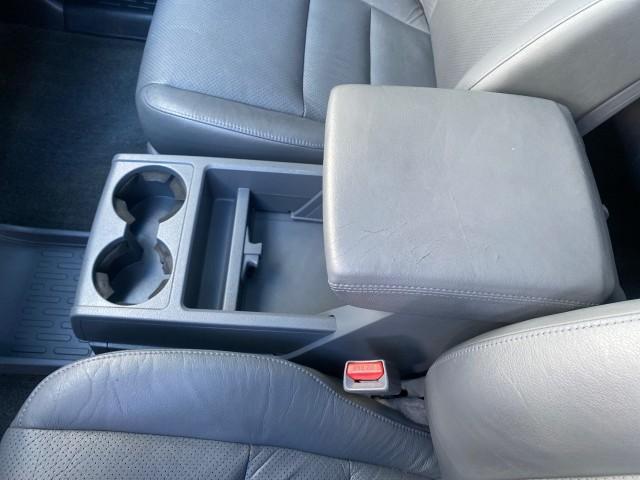 2007 Formal Black /Gray Honda Ridgeline RTL w/Leather 1 OWNER FL (2HJYK16557H) with an 3.5L SOHC PGM-FI 24-Valve VTEC V6 Engine engine, Automatic transmission, located at 4701 North Dixie Hwy, Pompano Beach, FL, 33064, (954) 422-2889, 26.240938, -80.123474 - OUR WEBPAGE FLORIDACARS1.COM HAS OVER 100 PHOTOS AND FREE CARFAX LINK 2007 HONDA RIDGELINE RTL 1 OWNER NEW $35,535 VIN: 2HJYK16557H543559 2 H J Y K 1 6 5 5 7 H 5 4 3 5 5 9 CREW PICKUP 3.5L V6 F SOHC 24V GASOLINE 21 MPG FRONT WHEEL DRIVE W/ 4X4 Features ABS Brakes Air Conditioning Alloy Wheels AM/FM - Photo#66