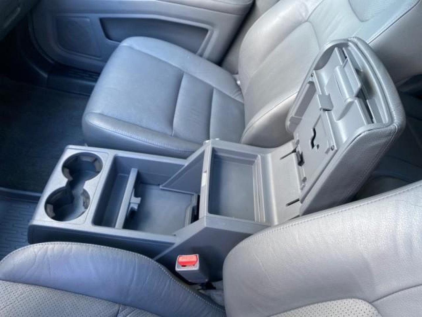 2007 Formal Black /Gray Honda Ridgeline RTL w/Leather 1 OWNER FL (2HJYK16557H) with an 3.5L SOHC PGM-FI 24-Valve VTEC V6 Engine engine, Automatic transmission, located at 4701 North Dixie Hwy, Pompano Beach, FL, 33064, (954) 422-2889, 26.240938, -80.123474 - OUR WEBPAGE FLORIDACARS1.COM HAS OVER 100 PHOTOS AND FREE CARFAX LINK 2007 HONDA RIDGELINE RTL 1 OWNER NEW $35,535 VIN: 2HJYK16557H543559 2 H J Y K 1 6 5 5 7 H 5 4 3 5 5 9 CREW PICKUP 3.5L V6 F SOHC 24V GASOLINE 21 MPG FRONT WHEEL DRIVE W/ 4X4 Features ABS Brakes Air Conditioning Alloy Wheels AM/FM - Photo#67