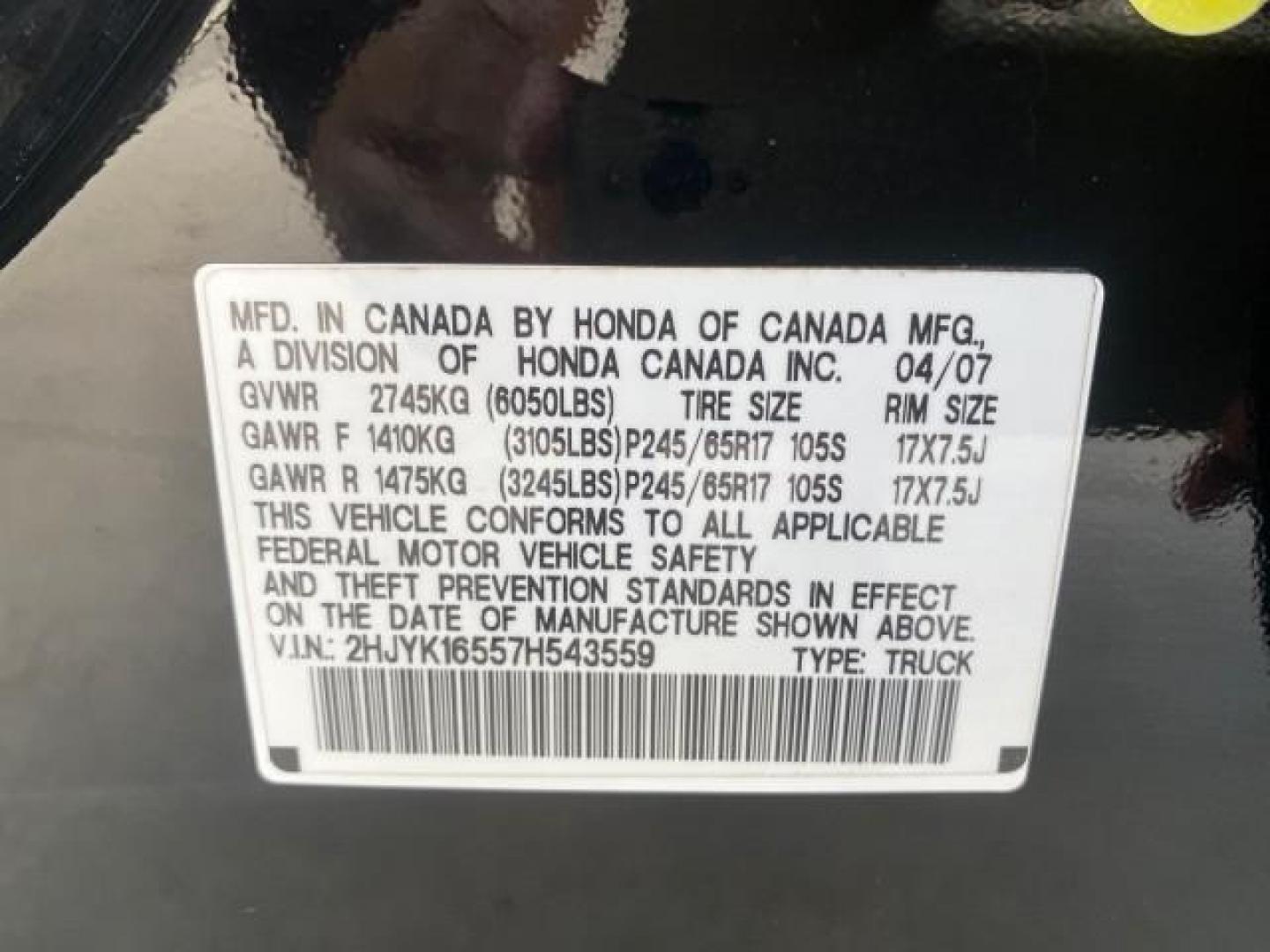2007 Formal Black /Gray Honda Ridgeline RTL w/Leather 1 OWNER FL (2HJYK16557H) with an 3.5L SOHC PGM-FI 24-Valve VTEC V6 Engine engine, Automatic transmission, located at 4701 North Dixie Hwy, Pompano Beach, FL, 33064, (954) 422-2889, 26.240938, -80.123474 - OUR WEBPAGE FLORIDACARS1.COM HAS OVER 100 PHOTOS AND FREE CARFAX LINK 2007 HONDA RIDGELINE RTL 1 OWNER NEW $35,535 VIN: 2HJYK16557H543559 2 H J Y K 1 6 5 5 7 H 5 4 3 5 5 9 CREW PICKUP 3.5L V6 F SOHC 24V GASOLINE 21 MPG FRONT WHEEL DRIVE W/ 4X4 Features ABS Brakes Air Conditioning Alloy Wheels AM/FM - Photo#78