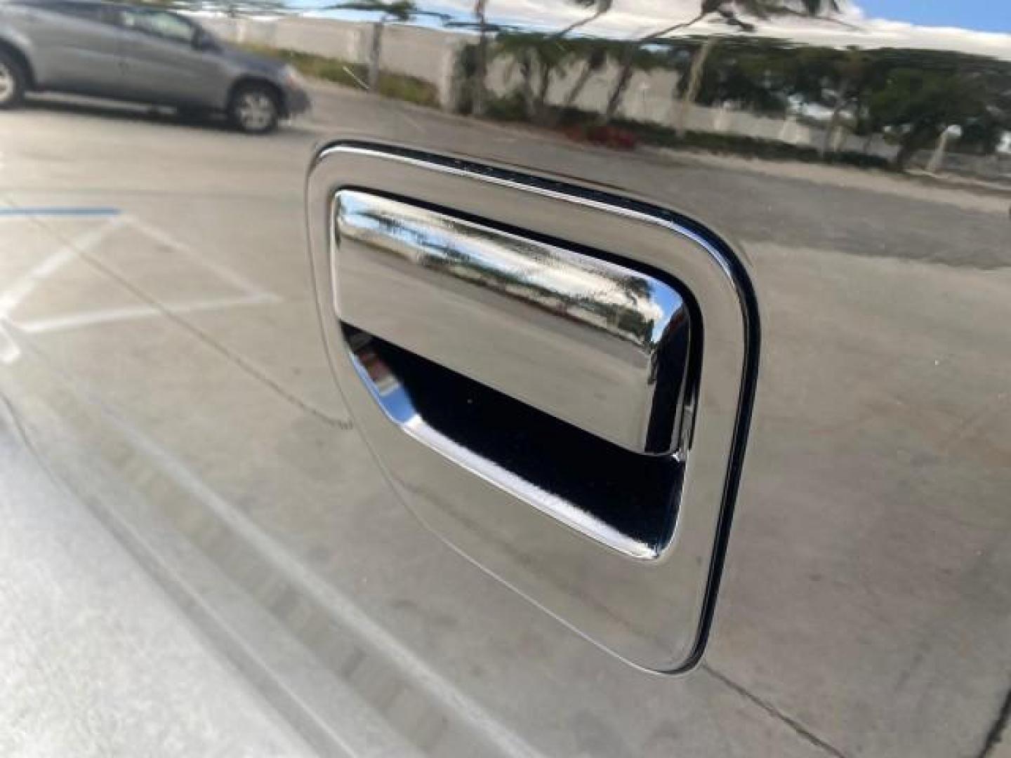 2007 Formal Black /Gray Honda Ridgeline RTL w/Leather 1 OWNER FL (2HJYK16557H) with an 3.5L SOHC PGM-FI 24-Valve VTEC V6 Engine engine, Automatic transmission, located at 4701 North Dixie Hwy, Pompano Beach, FL, 33064, (954) 422-2889, 26.240938, -80.123474 - OUR WEBPAGE FLORIDACARS1.COM HAS OVER 100 PHOTOS AND FREE CARFAX LINK 2007 HONDA RIDGELINE RTL 1 OWNER NEW $35,535 VIN: 2HJYK16557H543559 2 H J Y K 1 6 5 5 7 H 5 4 3 5 5 9 CREW PICKUP 3.5L V6 F SOHC 24V GASOLINE 21 MPG FRONT WHEEL DRIVE W/ 4X4 Features ABS Brakes Air Conditioning Alloy Wheels AM/FM - Photo#80