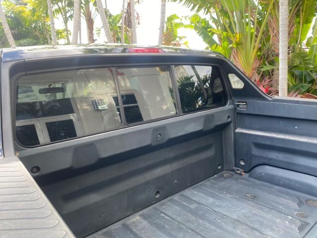 2007 Formal Black /Gray Honda Ridgeline RTL w/Leather 1 OWNER FL (2HJYK16557H) with an 3.5L SOHC PGM-FI 24-Valve VTEC V6 Engine engine, Automatic transmission, located at 4701 North Dixie Hwy, Pompano Beach, FL, 33064, (954) 422-2889, 26.240938, -80.123474 - OUR WEBPAGE FLORIDACARS1.COM HAS OVER 100 PHOTOS AND FREE CARFAX LINK 2007 HONDA RIDGELINE RTL 1 OWNER NEW $35,535 VIN: 2HJYK16557H543559 2 H J Y K 1 6 5 5 7 H 5 4 3 5 5 9 CREW PICKUP 3.5L V6 F SOHC 24V GASOLINE 21 MPG FRONT WHEEL DRIVE W/ 4X4 Features ABS Brakes Air Conditioning Alloy Wheels AM/FM - Photo#98