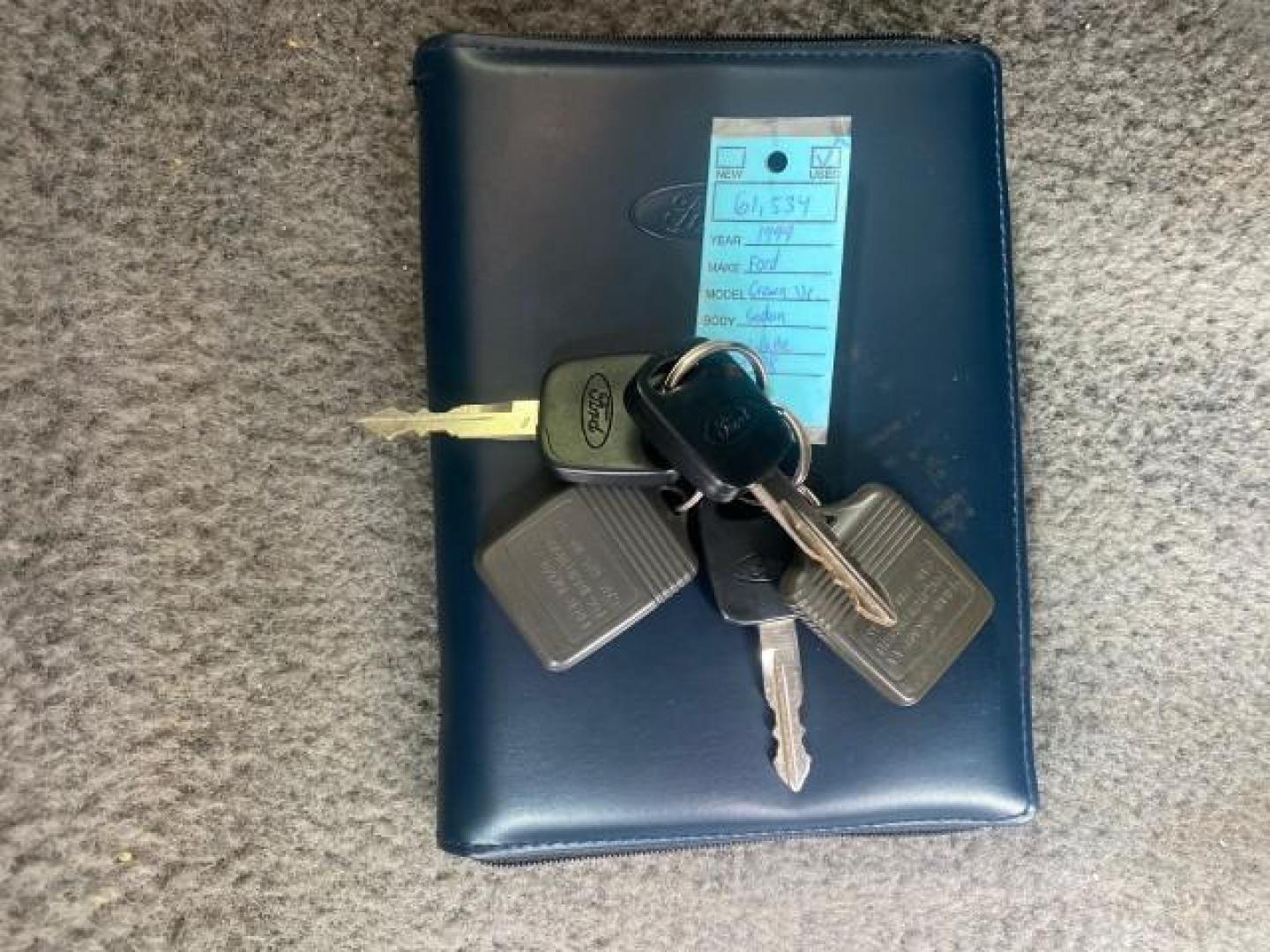 1999 Vibrant White /Lt/Med Parchment Ford Crown Victoria LX LOW MILES 61,537 (2FAFP74W6XX) with an 4.6L SMPI V8 Engine engine, Automatic transmission, located at 4701 North Dixie Hwy, Pompano Beach, FL, 33064, (954) 422-2889, 26.240938, -80.123474 - OUR WEBPAGE FLORIDACARS1.COM HAS OVER 100 PHOTOS AND FREE CARFAX LINK 1999 FORD CROWN VICTORIA LX VIN: 2FAFP74W6XX154498 2 F A F P 7 4 W 6 X X 1 5 4 4 9 8 SEDAN 4 DR 4.6L V8 F GASOLINE 26 MPG REAR WHEEL DRIVE Features ABS Brakes Air Conditioning AM/FM Stereo Automatic Transmission Cassette Player CD - Photo#23