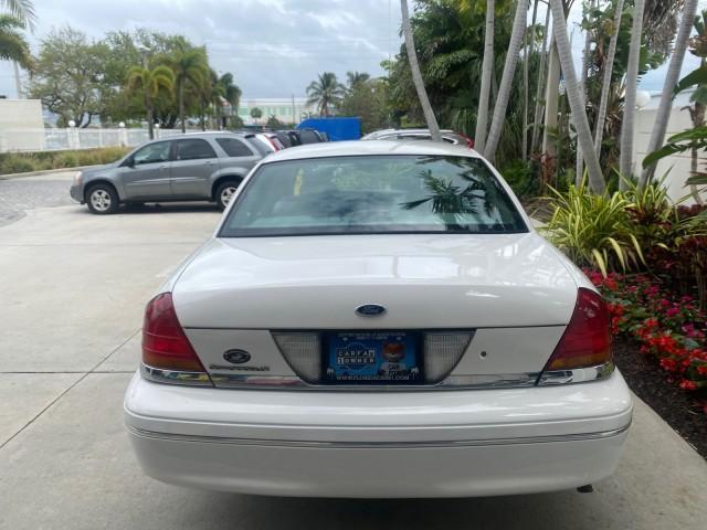 1999 Vibrant White /Lt/Med Parchment Ford Crown Victoria LX LOW MILES 61,537 (2FAFP74W6XX) with an 4.6L SMPI V8 Engine engine, Automatic transmission, located at 4701 North Dixie Hwy, Pompano Beach, FL, 33064, (954) 422-2889, 26.240938, -80.123474 - OUR WEBPAGE FLORIDACARS1.COM HAS OVER 100 PHOTOS AND FREE CARFAX LINK 1999 FORD CROWN VICTORIA LX VIN: 2FAFP74W6XX154498 2 F A F P 7 4 W 6 X X 1 5 4 4 9 8 SEDAN 4 DR 4.6L V8 F GASOLINE 26 MPG REAR WHEEL DRIVE Features ABS Brakes Air Conditioning AM/FM Stereo Automatic Transmission Cassette Player CD - Photo#35
