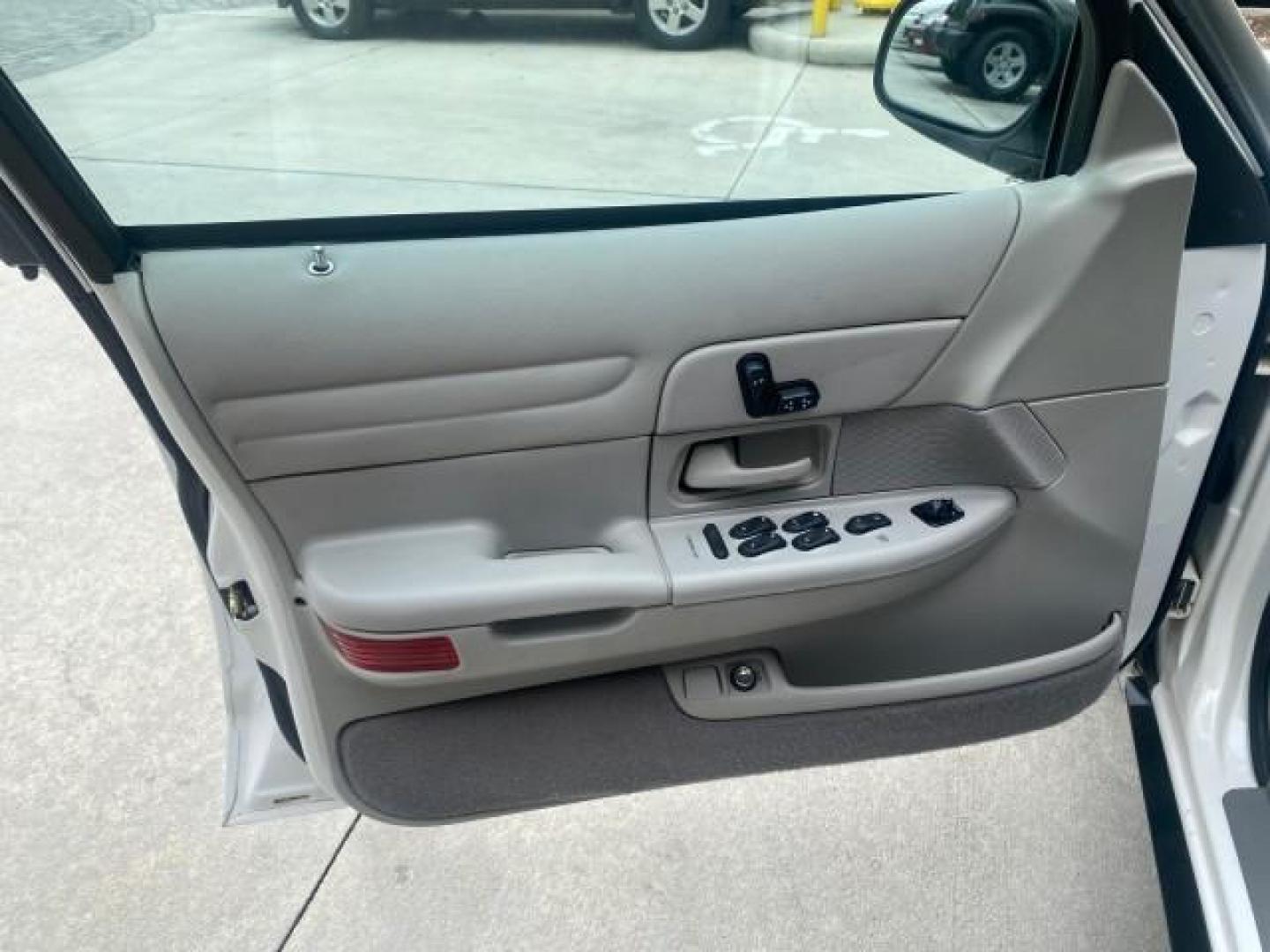 1999 Vibrant White /Lt/Med Parchment Ford Crown Victoria LX LOW MILES 61,537 (2FAFP74W6XX) with an 4.6L SMPI V8 Engine engine, Automatic transmission, located at 4701 North Dixie Hwy, Pompano Beach, FL, 33064, (954) 422-2889, 26.240938, -80.123474 - OUR WEBPAGE FLORIDACARS1.COM HAS OVER 100 PHOTOS AND FREE CARFAX LINK 1999 FORD CROWN VICTORIA LX VIN: 2FAFP74W6XX154498 2 F A F P 7 4 W 6 X X 1 5 4 4 9 8 SEDAN 4 DR 4.6L V8 F GASOLINE 26 MPG REAR WHEEL DRIVE Features ABS Brakes Air Conditioning AM/FM Stereo Automatic Transmission Cassette Player CD - Photo#41