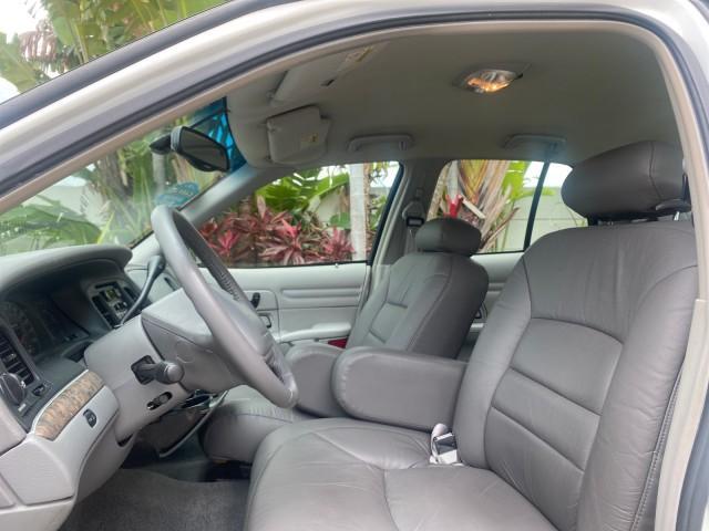 1999 Vibrant White /Lt/Med Parchment Ford Crown Victoria LX LOW MILES 61,537 (2FAFP74W6XX) with an 4.6L SMPI V8 Engine engine, Automatic transmission, located at 4701 North Dixie Hwy, Pompano Beach, FL, 33064, (954) 422-2889, 26.240938, -80.123474 - OUR WEBPAGE FLORIDACARS1.COM HAS OVER 100 PHOTOS AND FREE CARFAX LINK 1999 FORD CROWN VICTORIA LX VIN: 2FAFP74W6XX154498 2 F A F P 7 4 W 6 X X 1 5 4 4 9 8 SEDAN 4 DR 4.6L V8 F GASOLINE 26 MPG REAR WHEEL DRIVE Features ABS Brakes Air Conditioning AM/FM Stereo Automatic Transmission Cassette Player CD - Photo#42