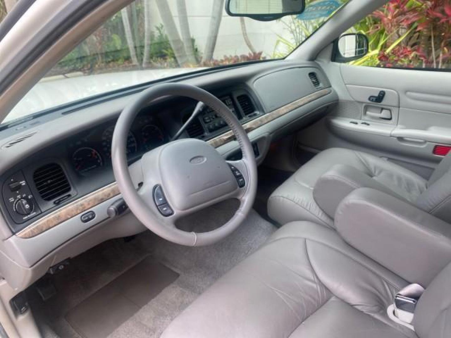 1999 Vibrant White /Lt/Med Parchment Ford Crown Victoria LX LOW MILES 61,537 (2FAFP74W6XX) with an 4.6L SMPI V8 Engine engine, Automatic transmission, located at 4701 North Dixie Hwy, Pompano Beach, FL, 33064, (954) 422-2889, 26.240938, -80.123474 - OUR WEBPAGE FLORIDACARS1.COM HAS OVER 100 PHOTOS AND FREE CARFAX LINK 1999 FORD CROWN VICTORIA LX VIN: 2FAFP74W6XX154498 2 F A F P 7 4 W 6 X X 1 5 4 4 9 8 SEDAN 4 DR 4.6L V8 F GASOLINE 26 MPG REAR WHEEL DRIVE Features ABS Brakes Air Conditioning AM/FM Stereo Automatic Transmission Cassette Player CD - Photo#49