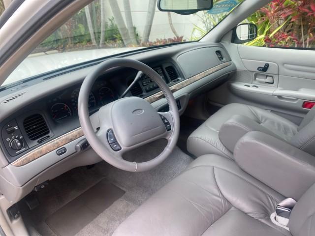 1999 Vibrant White /Lt/Med Parchment Ford Crown Victoria LX LOW MILES 61,537 (2FAFP74W6XX) with an 4.6L SMPI V8 Engine engine, Automatic transmission, located at 4701 North Dixie Hwy, Pompano Beach, FL, 33064, (954) 422-2889, 26.240938, -80.123474 - OUR WEBPAGE FLORIDACARS1.COM HAS OVER 100 PHOTOS AND FREE CARFAX LINK 1999 FORD CROWN VICTORIA LX VIN: 2FAFP74W6XX154498 2 F A F P 7 4 W 6 X X 1 5 4 4 9 8 SEDAN 4 DR 4.6L V8 F GASOLINE 26 MPG REAR WHEEL DRIVE Features ABS Brakes Air Conditioning AM/FM Stereo Automatic Transmission Cassette Player CD - Photo#49