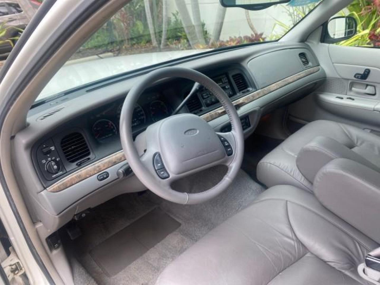 1999 Vibrant White /Lt/Med Parchment Ford Crown Victoria LX LOW MILES 61,537 (2FAFP74W6XX) with an 4.6L SMPI V8 Engine engine, Automatic transmission, located at 4701 North Dixie Hwy, Pompano Beach, FL, 33064, (954) 422-2889, 26.240938, -80.123474 - OUR WEBPAGE FLORIDACARS1.COM HAS OVER 100 PHOTOS AND FREE CARFAX LINK 1999 FORD CROWN VICTORIA LX VIN: 2FAFP74W6XX154498 2 F A F P 7 4 W 6 X X 1 5 4 4 9 8 SEDAN 4 DR 4.6L V8 F GASOLINE 26 MPG REAR WHEEL DRIVE Features ABS Brakes Air Conditioning AM/FM Stereo Automatic Transmission Cassette Player CD - Photo#50