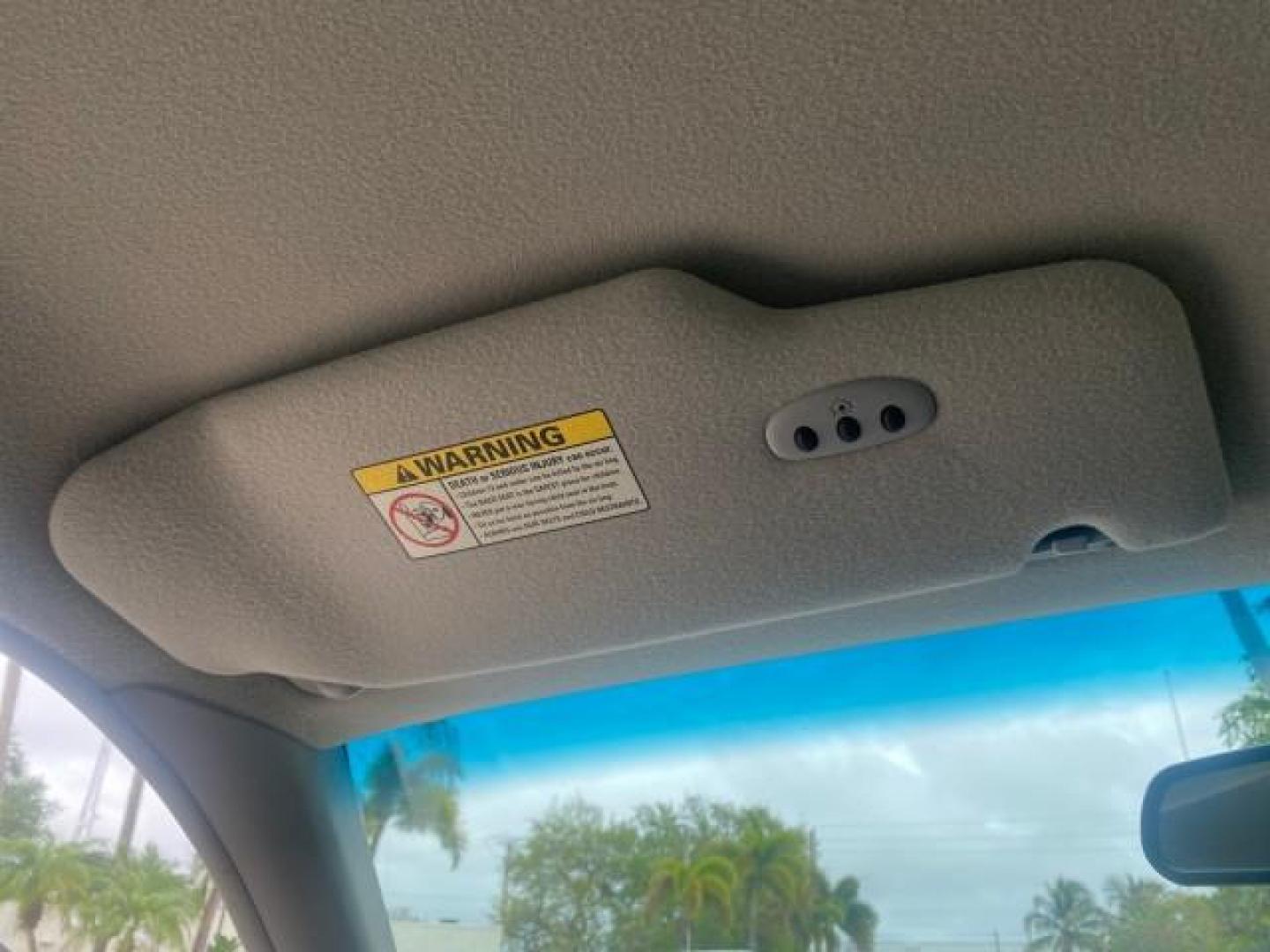 1999 Vibrant White /Lt/Med Parchment Ford Crown Victoria LX LOW MILES 61,537 (2FAFP74W6XX) with an 4.6L SMPI V8 Engine engine, Automatic transmission, located at 4701 North Dixie Hwy, Pompano Beach, FL, 33064, (954) 422-2889, 26.240938, -80.123474 - OUR WEBPAGE FLORIDACARS1.COM HAS OVER 100 PHOTOS AND FREE CARFAX LINK 1999 FORD CROWN VICTORIA LX VIN: 2FAFP74W6XX154498 2 F A F P 7 4 W 6 X X 1 5 4 4 9 8 SEDAN 4 DR 4.6L V8 F GASOLINE 26 MPG REAR WHEEL DRIVE Features ABS Brakes Air Conditioning AM/FM Stereo Automatic Transmission Cassette Player CD - Photo#64