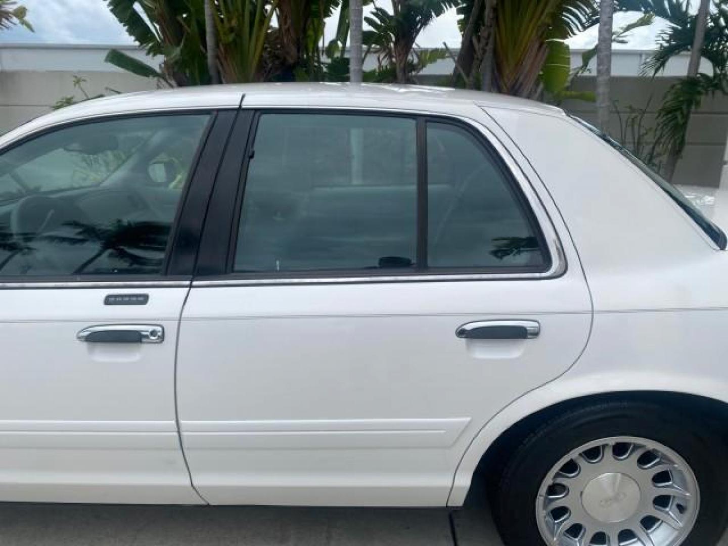1999 Vibrant White /Lt/Med Parchment Ford Crown Victoria LX LOW MILES 61,537 (2FAFP74W6XX) with an 4.6L SMPI V8 Engine engine, Automatic transmission, located at 4701 North Dixie Hwy, Pompano Beach, FL, 33064, (954) 422-2889, 26.240938, -80.123474 - OUR WEBPAGE FLORIDACARS1.COM HAS OVER 100 PHOTOS AND FREE CARFAX LINK 1999 FORD CROWN VICTORIA LX VIN: 2FAFP74W6XX154498 2 F A F P 7 4 W 6 X X 1 5 4 4 9 8 SEDAN 4 DR 4.6L V8 F GASOLINE 26 MPG REAR WHEEL DRIVE Features ABS Brakes Air Conditioning AM/FM Stereo Automatic Transmission Cassette Player CD - Photo#69