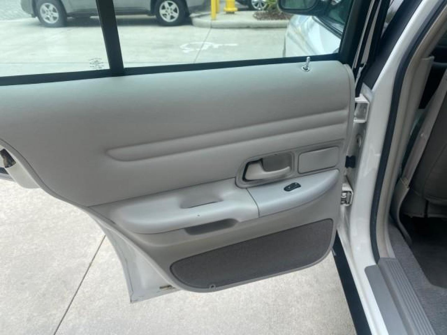 1999 Vibrant White /Lt/Med Parchment Ford Crown Victoria LX LOW MILES 61,537 (2FAFP74W6XX) with an 4.6L SMPI V8 Engine engine, Automatic transmission, located at 4701 North Dixie Hwy, Pompano Beach, FL, 33064, (954) 422-2889, 26.240938, -80.123474 - OUR WEBPAGE FLORIDACARS1.COM HAS OVER 100 PHOTOS AND FREE CARFAX LINK 1999 FORD CROWN VICTORIA LX VIN: 2FAFP74W6XX154498 2 F A F P 7 4 W 6 X X 1 5 4 4 9 8 SEDAN 4 DR 4.6L V8 F GASOLINE 26 MPG REAR WHEEL DRIVE Features ABS Brakes Air Conditioning AM/FM Stereo Automatic Transmission Cassette Player CD - Photo#71