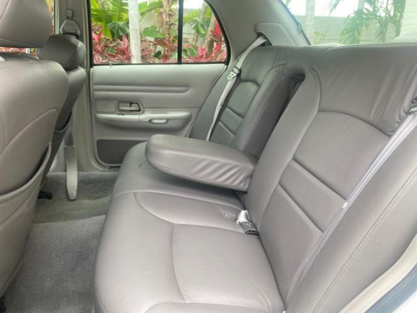 1999 Vibrant White /Lt/Med Parchment Ford Crown Victoria LX LOW MILES 61,537 (2FAFP74W6XX) with an 4.6L SMPI V8 Engine engine, Automatic transmission, located at 4701 North Dixie Hwy, Pompano Beach, FL, 33064, (954) 422-2889, 26.240938, -80.123474 - OUR WEBPAGE FLORIDACARS1.COM HAS OVER 100 PHOTOS AND FREE CARFAX LINK 1999 FORD CROWN VICTORIA LX VIN: 2FAFP74W6XX154498 2 F A F P 7 4 W 6 X X 1 5 4 4 9 8 SEDAN 4 DR 4.6L V8 F GASOLINE 26 MPG REAR WHEEL DRIVE Features ABS Brakes Air Conditioning AM/FM Stereo Automatic Transmission Cassette Player CD - Photo#72