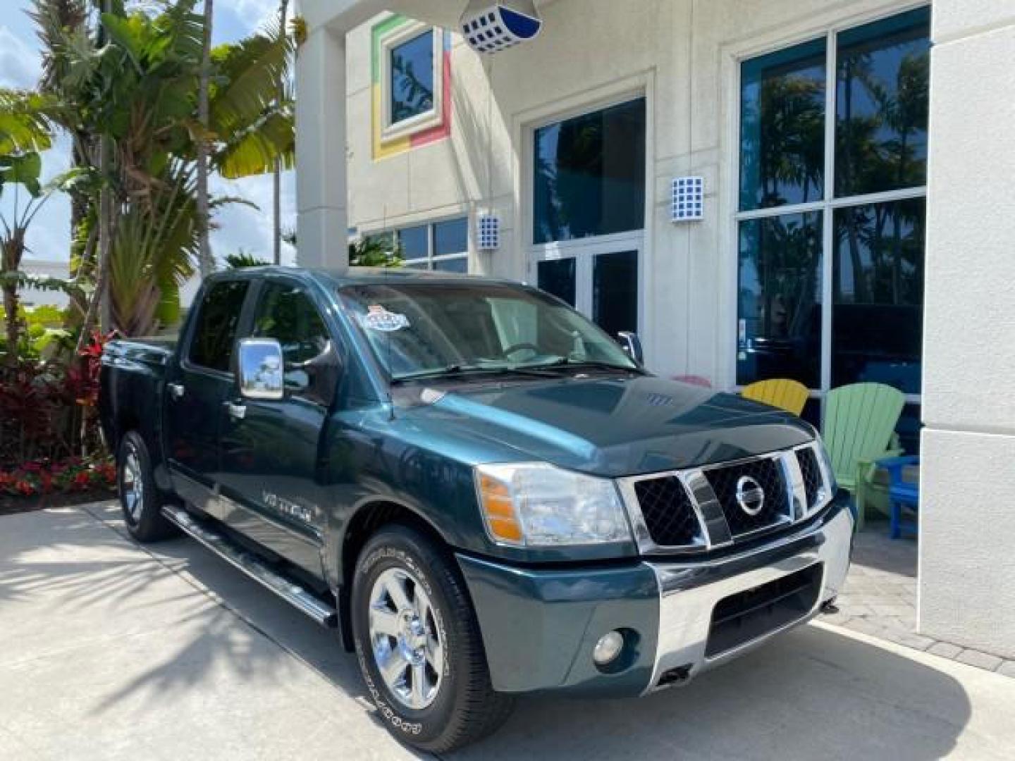 2007 Majestic Blue /Graphite/Titanium Nissan Titan LE 1 OWNER LOW MILES 39,670 CREW CAB (1N6BA07A67N) with an 5.6L DOHC 32-Valve V8 FFV Engine engine, Automatic transmission, located at 4701 North Dixie Hwy, Pompano Beach, FL, 33064, (954) 422-2889, 26.240938, -80.123474 - OUR WEBPAGE FLORIDACARS1.COM HAS OVER 100 PHOTOS AND FREE CARFAX LINK 2007 NISSAN TITAN LE FFV 1 OWNER CREW CAB LEATHER VIN: 1N6BA07A67N215171 1 N 6 B A 0 7 A 6 7 N 2 1 5 1 7 1 CREW PICKUP 5.6L V8 F DOHC 32V FLEX FUEL 19 MPG REAR WHEEL DRIVE Features ABS Brakes Air Conditioning Alloy Wheels AM/FM St - Photo#1
