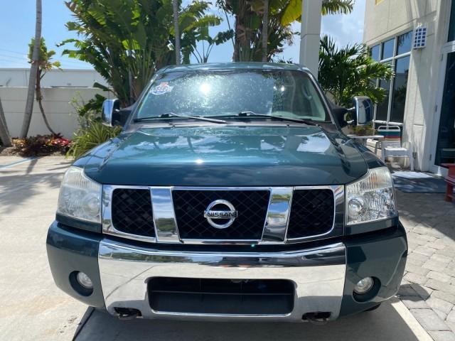 2007 Majestic Blue /Graphite/Titanium Nissan Titan LE 1 OWNER LOW MILES 39,670 CREW CAB (1N6BA07A67N) with an 5.6L DOHC 32-Valve V8 FFV Engine engine, Automatic transmission, located at 4701 North Dixie Hwy, Pompano Beach, FL, 33064, (954) 422-2889, 26.240938, -80.123474 - OUR WEBPAGE FLORIDACARS1.COM HAS OVER 100 PHOTOS AND FREE CARFAX LINK 2007 NISSAN TITAN LE FFV 1 OWNER CREW CAB LEATHER VIN: 1N6BA07A67N215171 1 N 6 B A 0 7 A 6 7 N 2 1 5 1 7 1 CREW PICKUP 5.6L V8 F DOHC 32V FLEX FUEL 19 MPG REAR WHEEL DRIVE Features ABS Brakes Air Conditioning Alloy Wheels AM/FM St - Photo#2