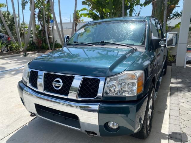 2007 Majestic Blue /Graphite/Titanium Nissan Titan LE 1 OWNER LOW MILES 39,670 CREW CAB (1N6BA07A67N) with an 5.6L DOHC 32-Valve V8 FFV Engine engine, Automatic transmission, located at 4701 North Dixie Hwy, Pompano Beach, FL, 33064, (954) 422-2889, 26.240938, -80.123474 - OUR WEBPAGE FLORIDACARS1.COM HAS OVER 100 PHOTOS AND FREE CARFAX LINK 2007 NISSAN TITAN LE FFV 1 OWNER CREW CAB LEATHER VIN: 1N6BA07A67N215171 1 N 6 B A 0 7 A 6 7 N 2 1 5 1 7 1 CREW PICKUP 5.6L V8 F DOHC 32V FLEX FUEL 19 MPG REAR WHEEL DRIVE Features ABS Brakes Air Conditioning Alloy Wheels AM/FM St - Photo#3